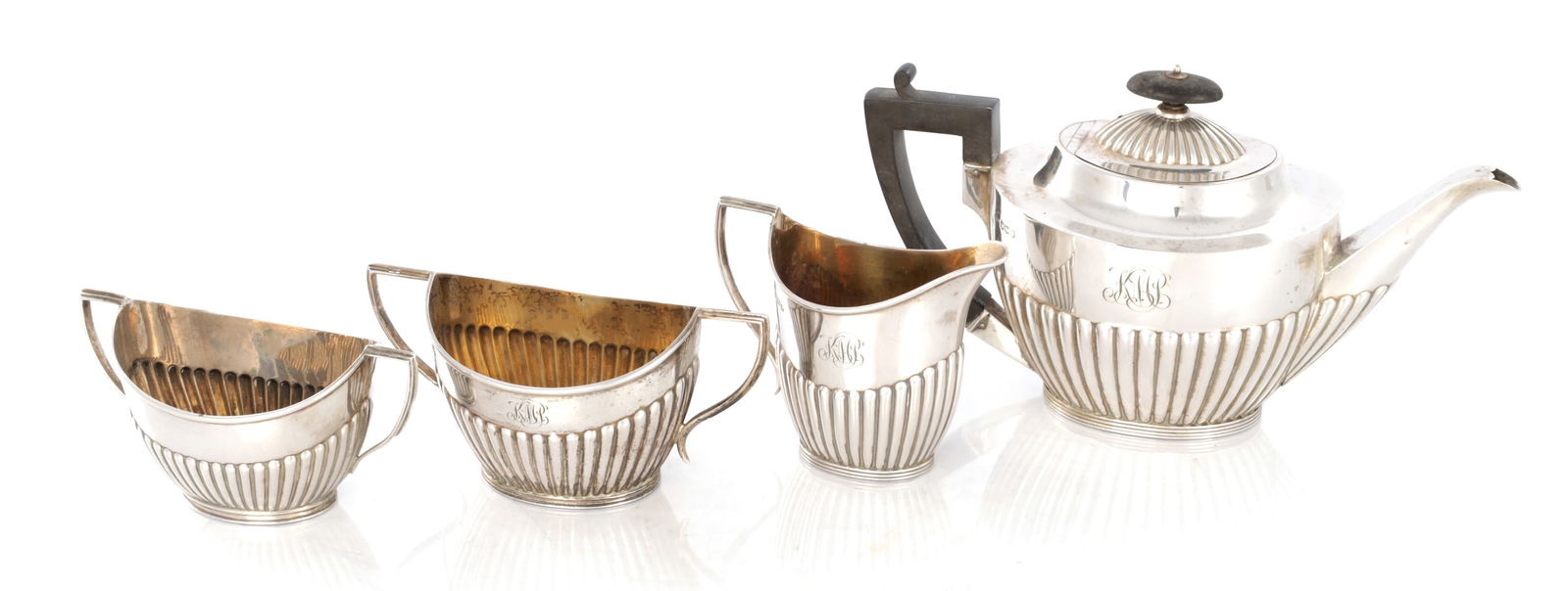 A VICTORIAN SILVER FOUR-PIECE TEA SERVICE (1 of 17)