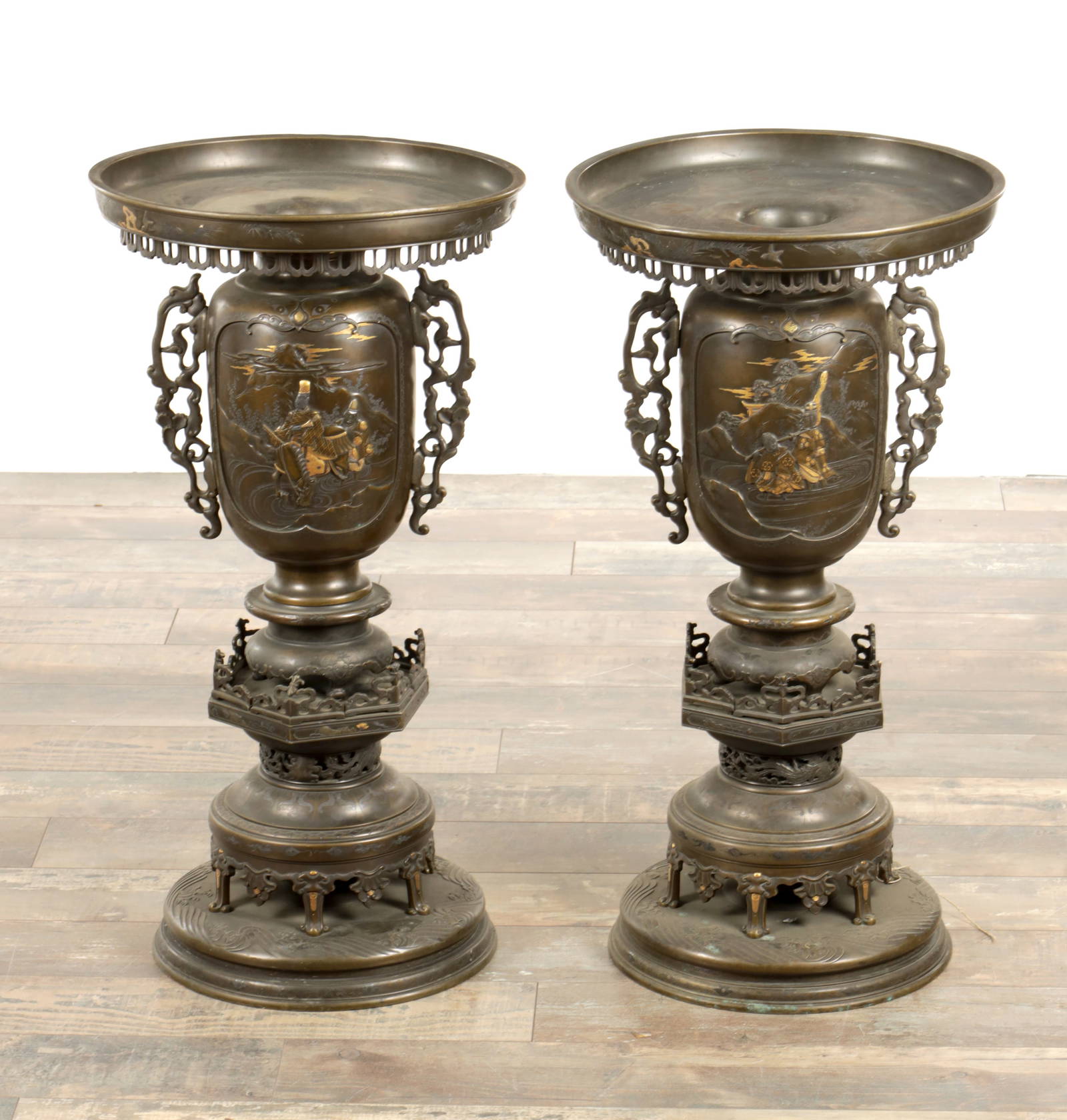 A LARGE AND IMPRESSIVE PAIR OF JAPANESE MEIJI PERIOD BRONZE SECTIONAL VASES