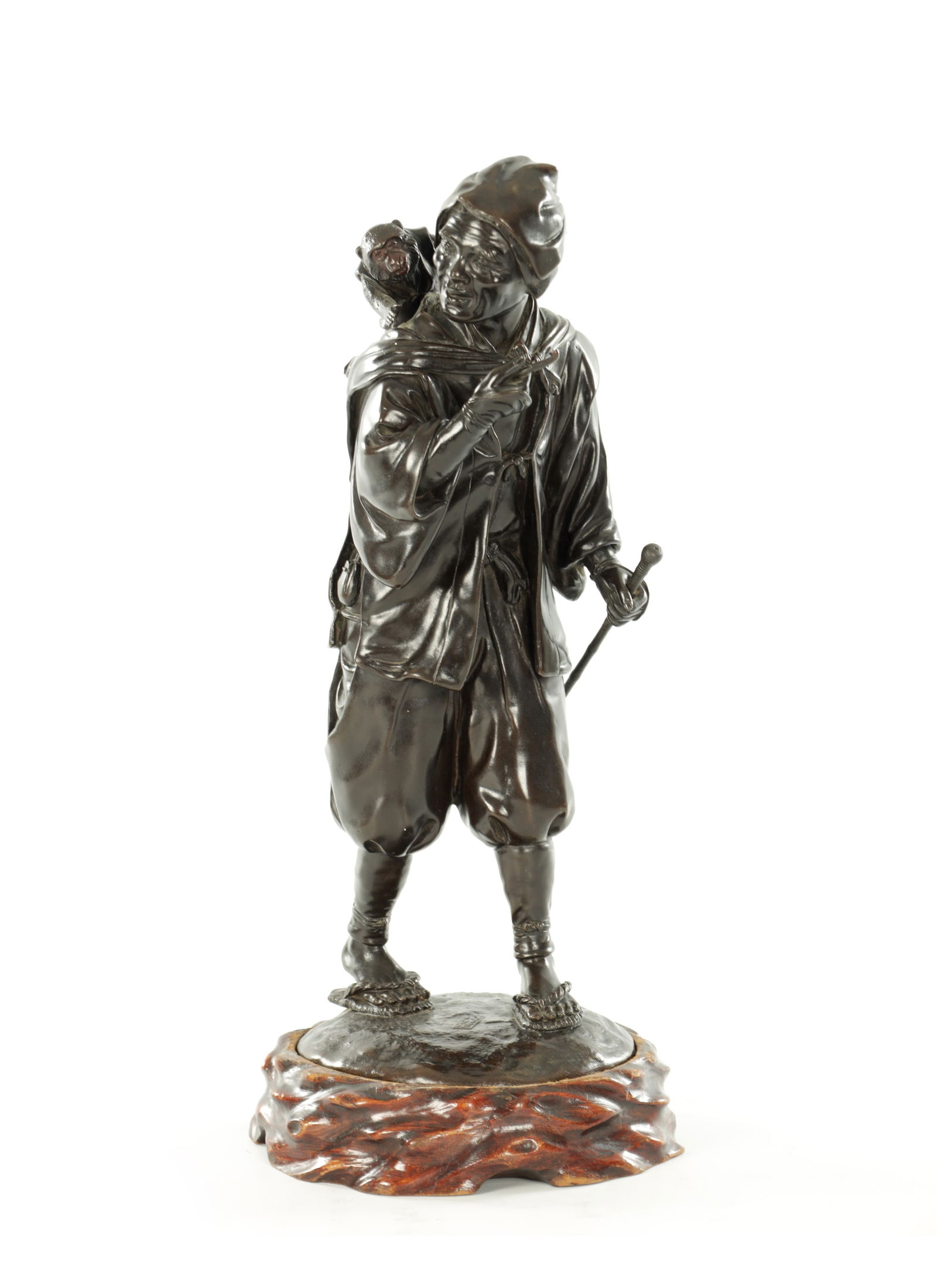 A JAPANESE MEIJI PERIOD PATINATED BRONZE OKIMONO (1 of 12)