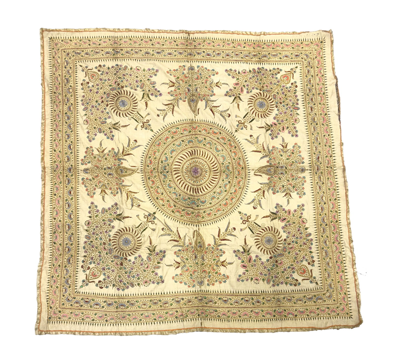 AN INDIAN SILK, GOLD WIRE EMBROIDERED TABLE COVER: AN INDIAN SILK, GOLD WIRE EMBROIDERED TABLE COVER the cream silk cloth is embroidered with intricate gold wire floral and leaf work, the central medallion filled with concentric rings with detailed pa