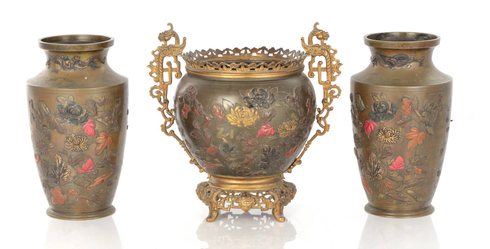 A JAPANESE MEIJI PERIOD BRONZE AND MIXED METAL GARNITURE