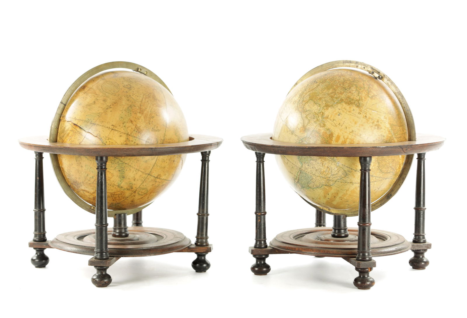 A PAIR OF 18TH CENTURY AND LATER TERRESTRIAL AND CELESTIAL GLOBES ON GLOBES: A PAIR OF 18TH CENTURY AND LATER TERRESTRIAL AND CELESTIAL GLOBES ON GLOBES the 12" globes manufactured by Gillman Joslin, Boston supported within brass meridians on oak turned wooden stands with turn