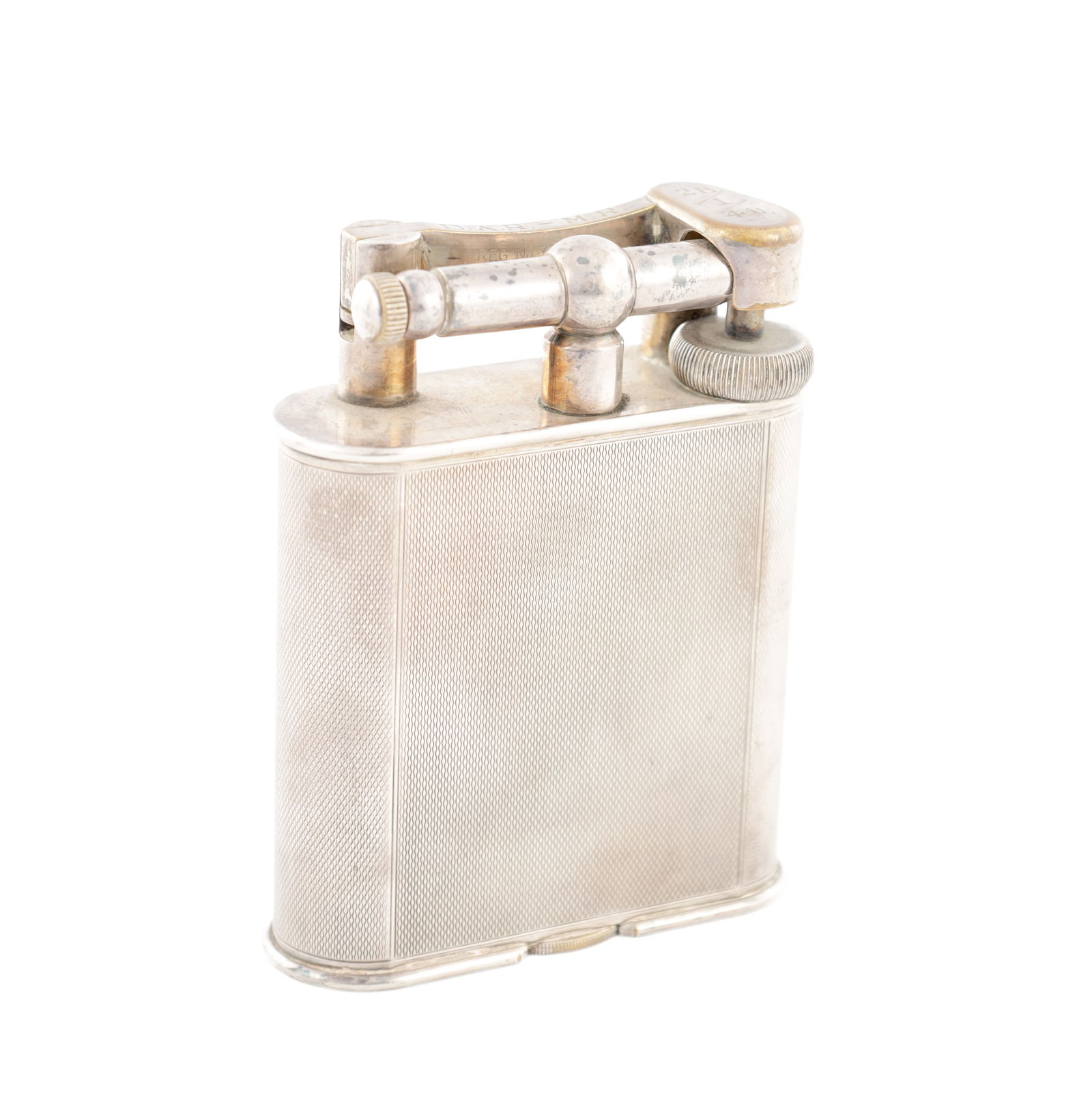 A LARGE VINTAGE SILVER PLATED DUNHILL TABLE LIGHTER: A LARGE VINTAGE SILVER PLATED DUNHILL TABLE LIGHTER with engine-turned body. (10.5cm high)