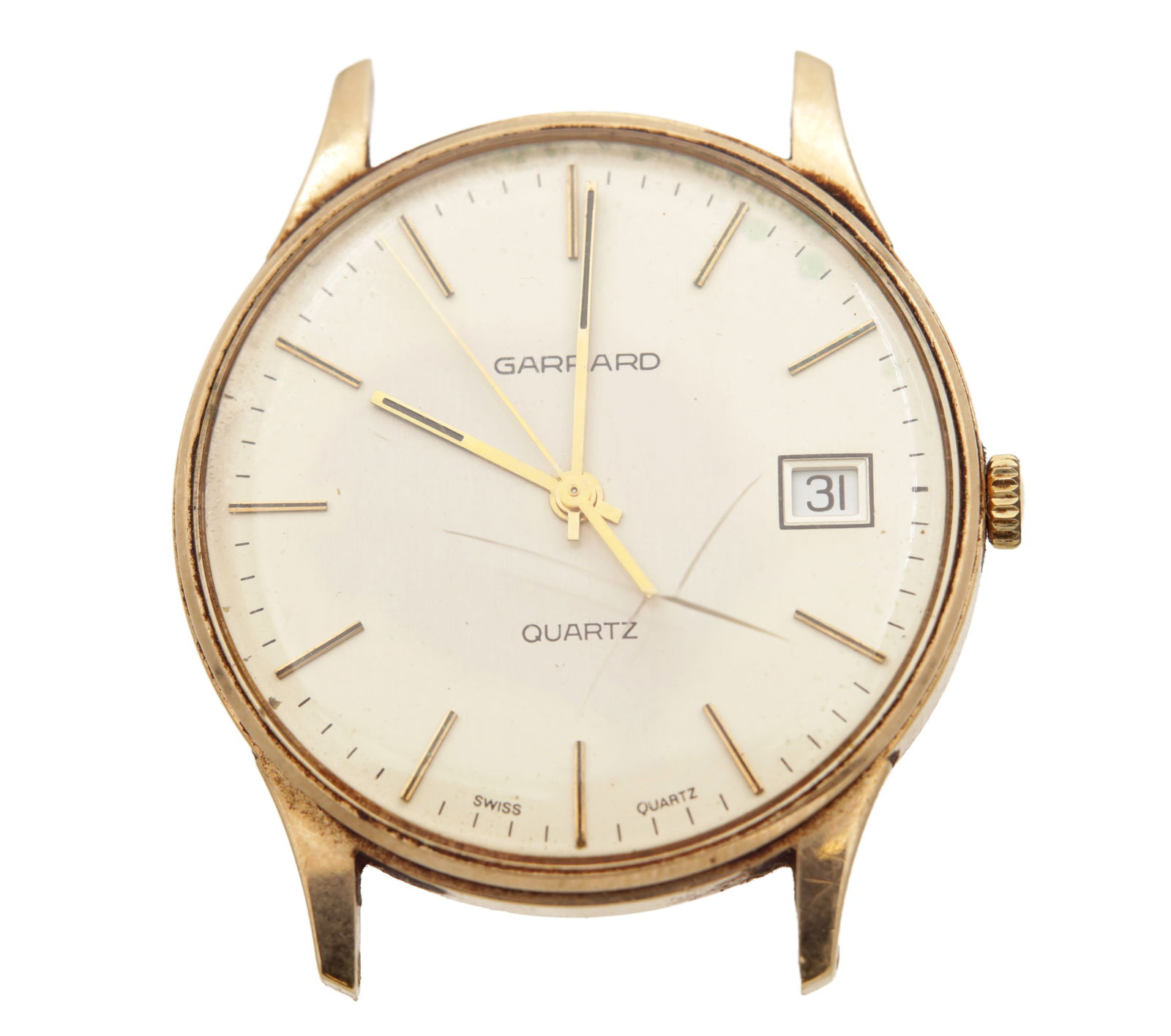A GENTLEMAN'S 9CT GOLD GARRARD QUARTZ WRIST WATCH: A GENTLEMAN'S 9CT GOLD GARRARD QUARTZ WRIST WATCH having a champagne dial with gold baton markers and calendar aperture. Total weight app. 25.5g (34mm diameter)