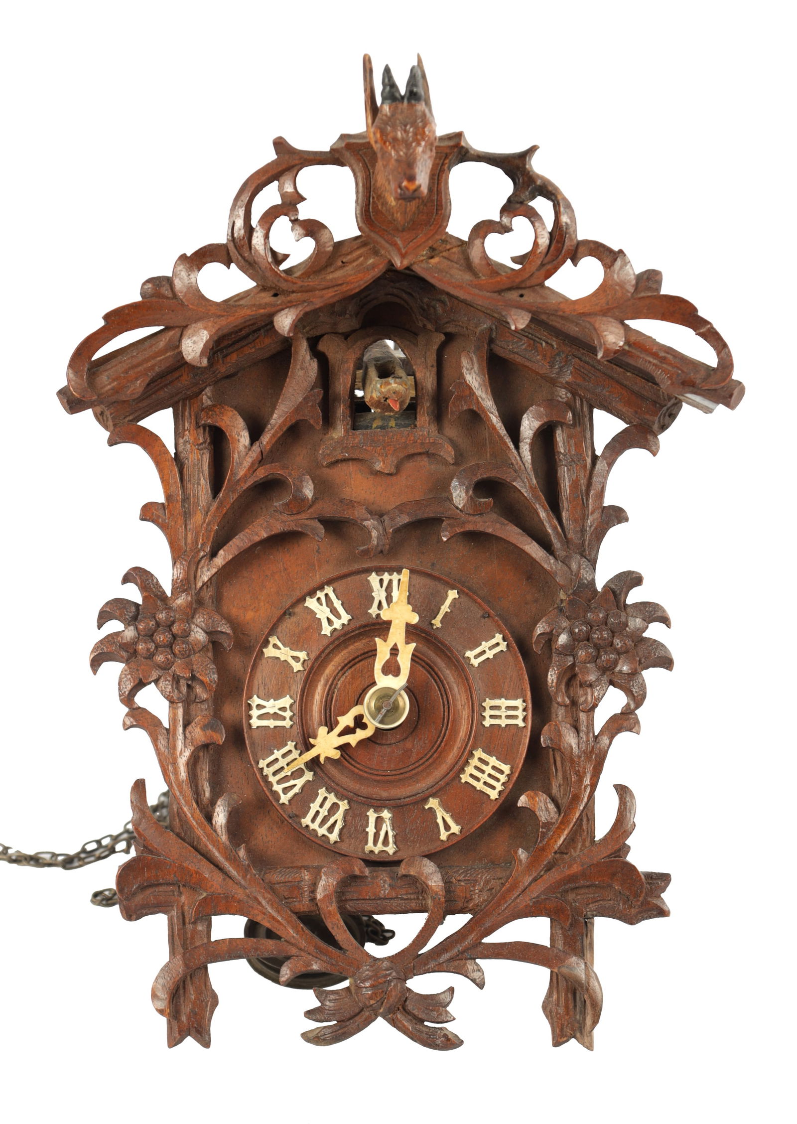 A RARE MINIATURE BLACK FOREST JOCLE CUCKOO CLOCK: A RARE MINIATURE BLACK FOREST JOCLE CUCKOO CLOCK, the carved case with Roman dial fronting a weight-driven wooden plated movement chiming the hours on two bellows. (24cm high)