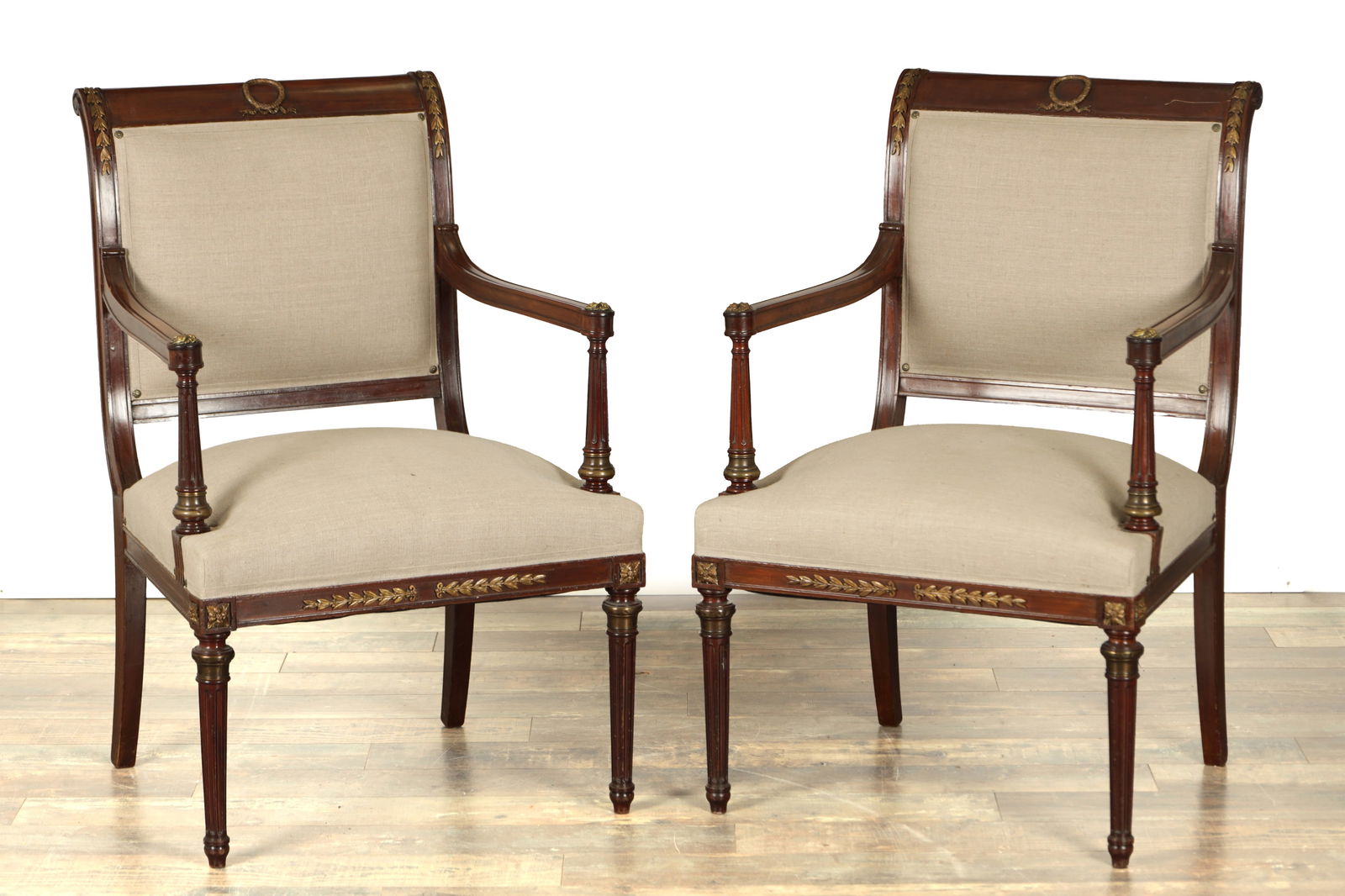 A PAIR OF LATE 19TH CENTURY FRENCH MAHOGANY AND ORMOLU MOUNTED UPHOLSTERED ARMCHAIRS (1 of 12)