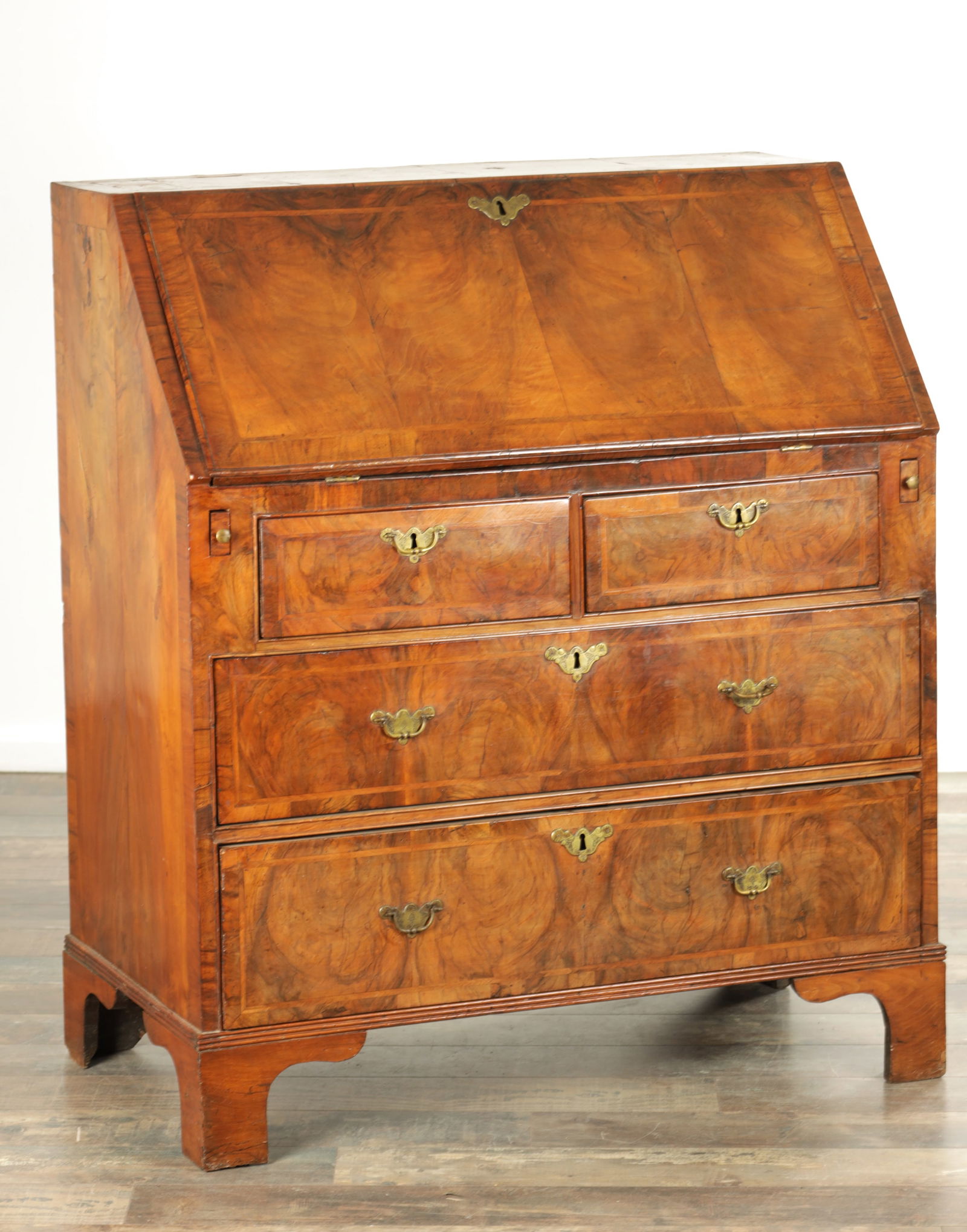 A WILLIAM AND MARY HERRING-BANDED FIGURED WALNUT BUREAU (1 of 16)