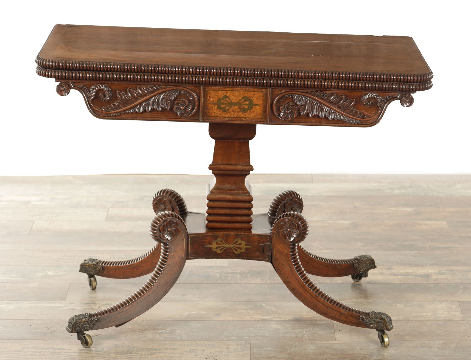 A GOOD REGENCY FLAMED MAHOGANY AND BRASS INLAID CARD TABLE IN THE MANNER OF TROTTER OF EDINBURGH (1 of 8)