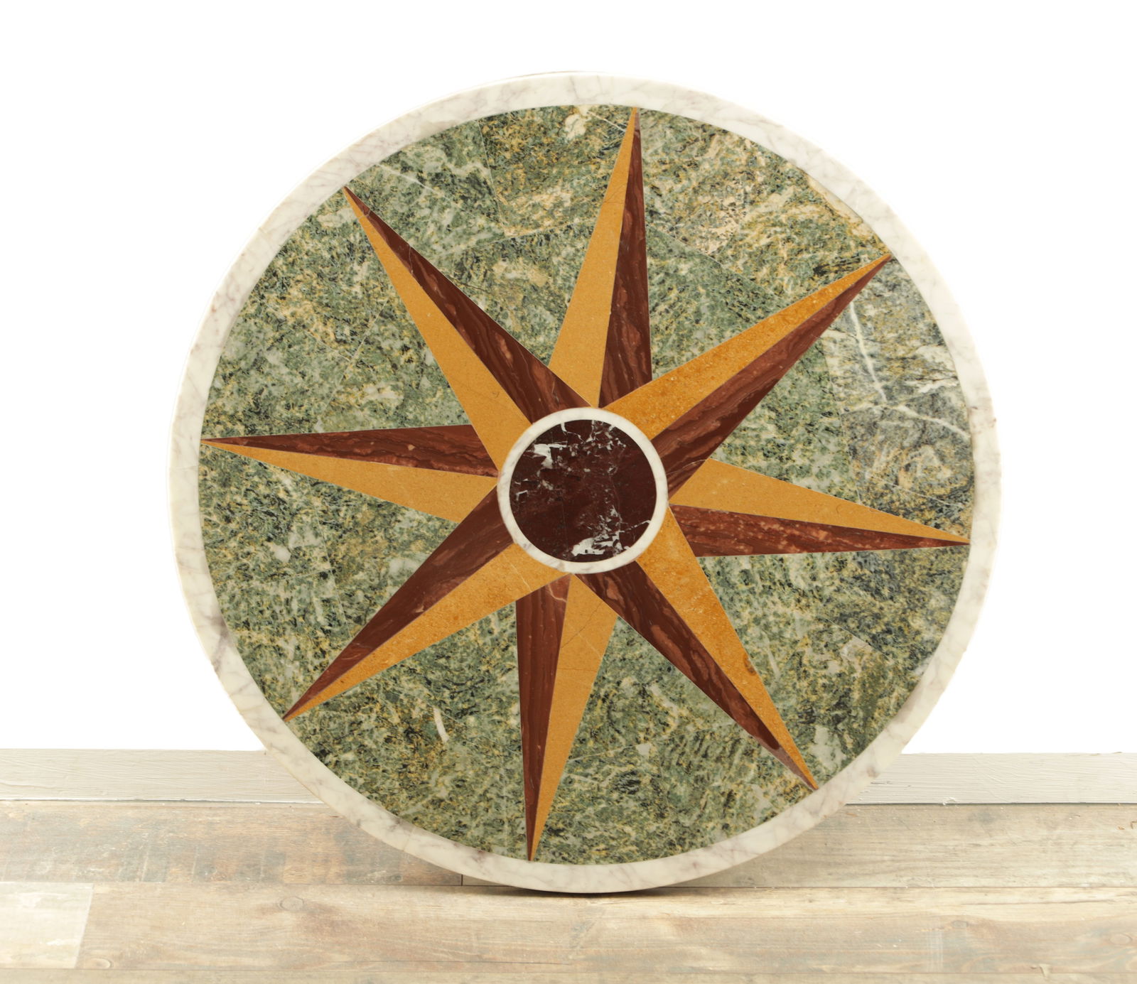 A 20TH CENTURY INLAID MARBLE TABLE TOP: A 20TH CENTURY INLAID MARBLE TABLE TOP of circular form with a star set centre. (67cm diameter )