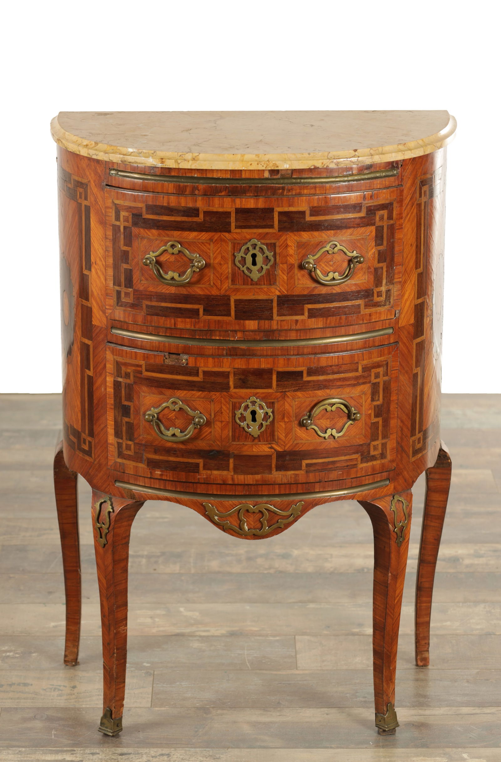 AN 18TH CENTURY KINGWOOD INLAID ITALIAN BOW-FRONTED COMMODE: AN 18TH CENTURY KINGWOOD INLAID ITALIAN BOW-FRONTED COMMODE with marble top above two frieze drawers fitted with brass handles and having geometrically inlaid designs, raised on slender legs with bras