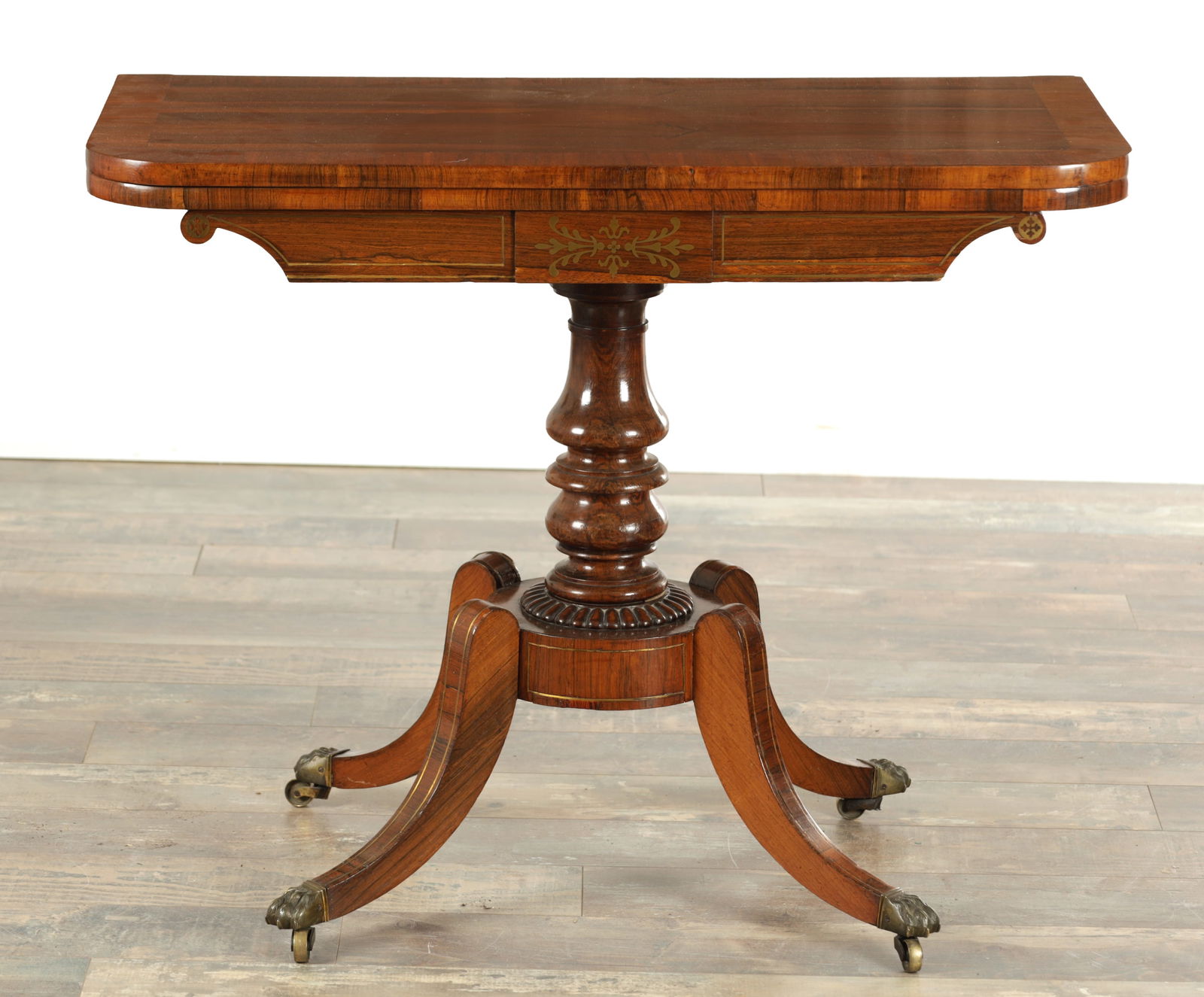 A REGENCY FIGURED ROSEWOOD AND BRASS INLAID CARD TABLE (1 of 8)