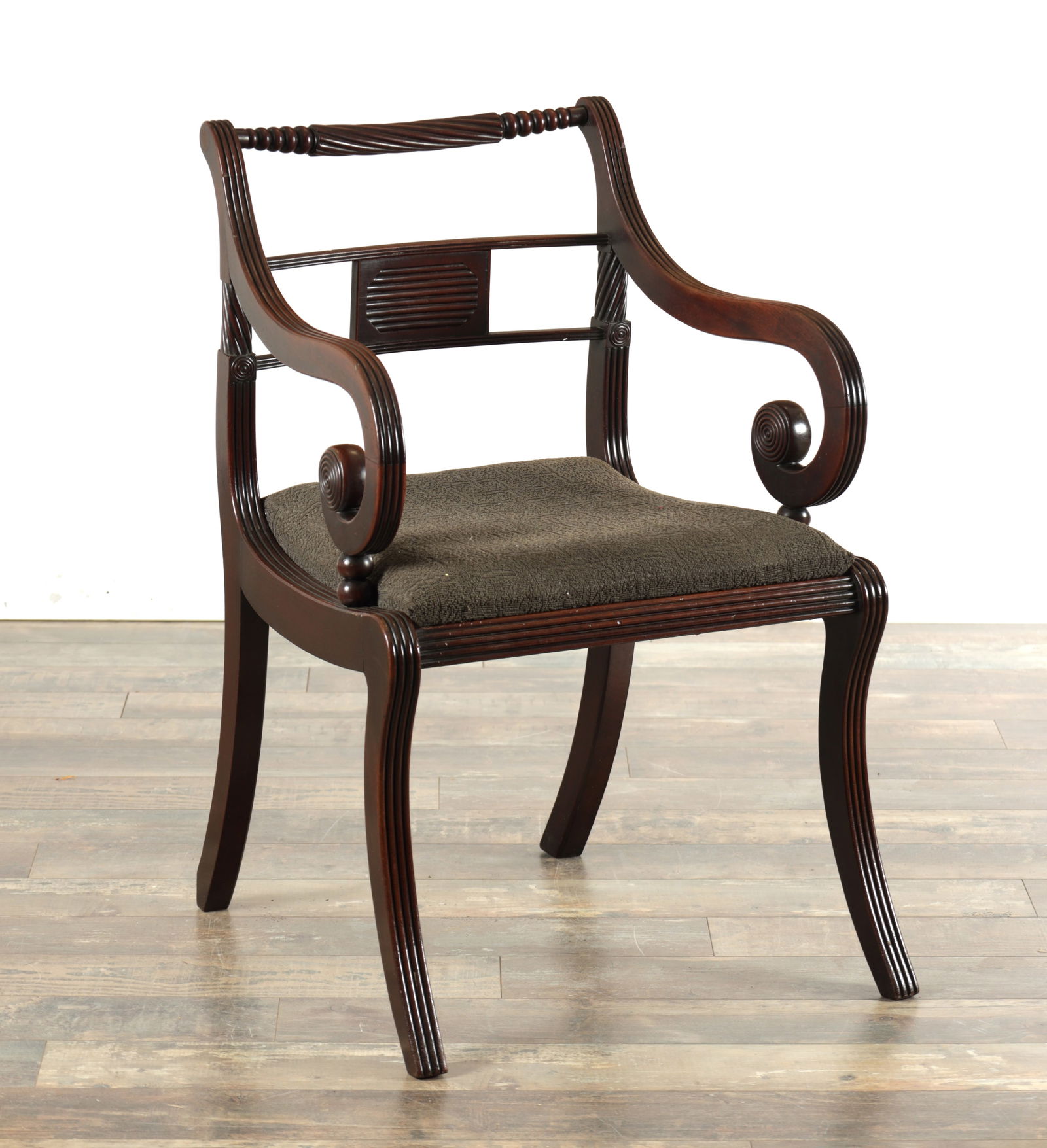 A REGENCY MAHOGANY BERGERE ARMCHAIR IN THE MANNER OF MORGAN AND SANDERS (1 of 5)