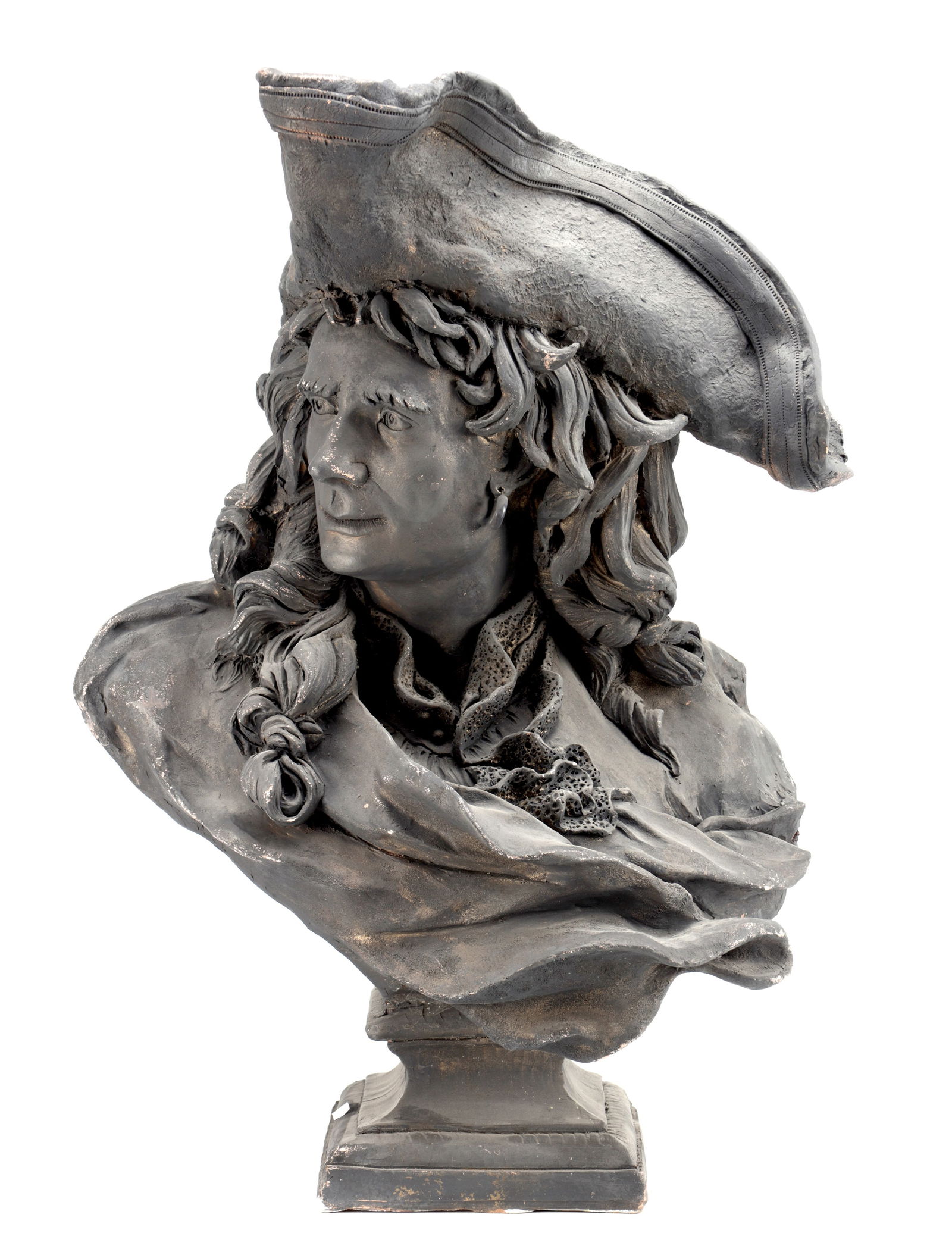 A 19TH CENTURY TERRACOTTA BUST OF A PIRATE: A 19TH CENTURY TERRACOTTA BUST OF A PIRATE modelled head and shoulders wearing a tricorn hat with long flowing hair and knotted cravat, the wind-swept drapery gathered to one side, on a square socle b