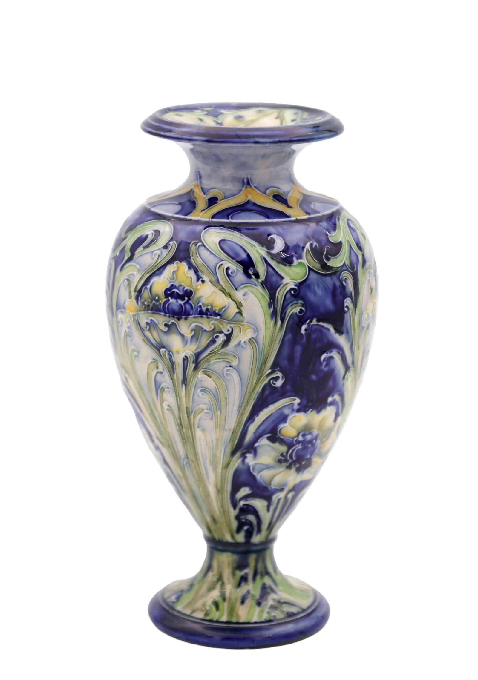 A 20TH CENTURY MOORCROFT POTTERY POPPY MACINTYRE MINIATURE VASE: A 20TH CENTURY MOORCROFT POTTERY POPPY MACINTYRE MINIATURE VASE of baluster form with a flared rim and slender neck, tubelined with stylised poppy blooms and scrolling foliage, in tones of deep blue,