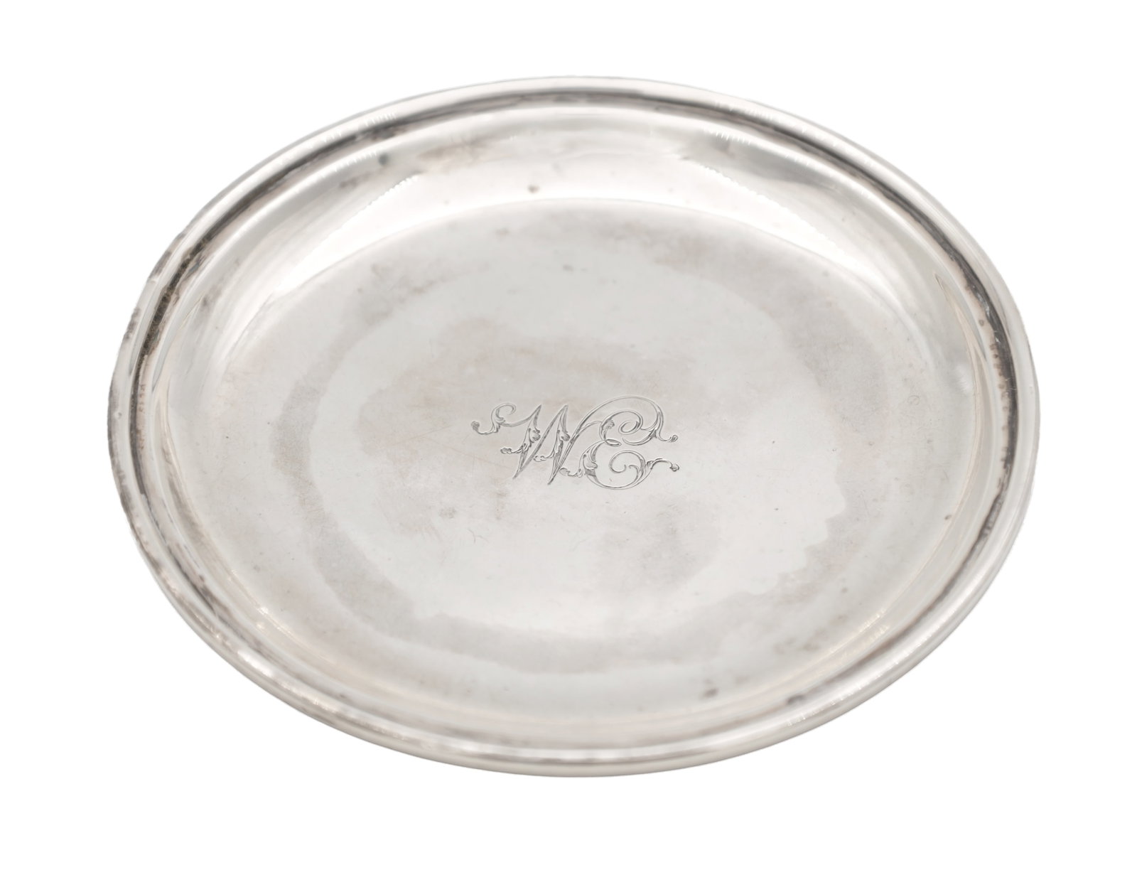 A GEORGE III SILVER COASTER: A GEORGE III SILVER COASTER Hallmarked Sheffield 1804 by John Watson. Total weight app. 80g. (Diameter 11.5cm)