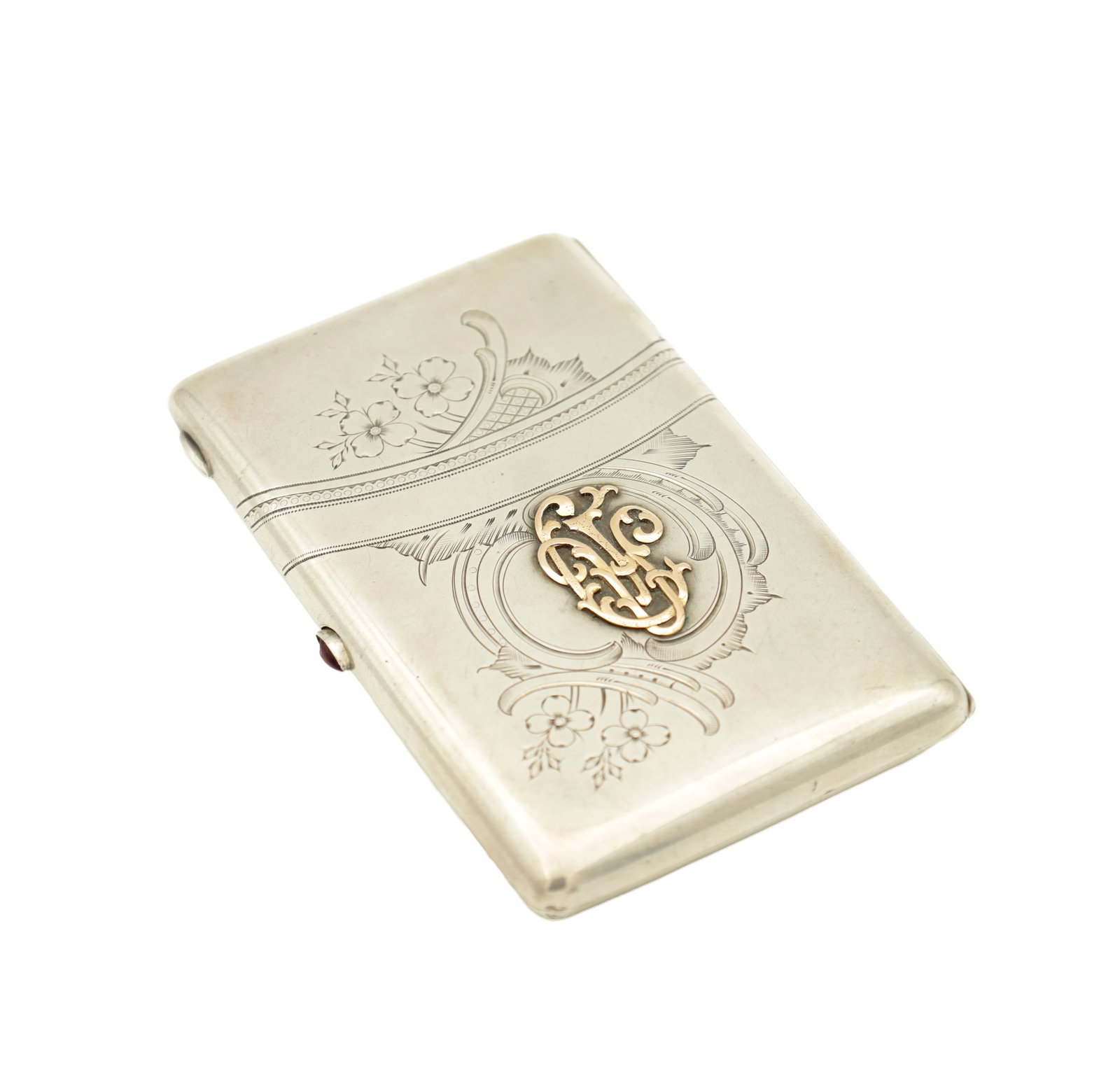 A RUSSIAN SILVER AND GOLD CIGARETTE CASE: A RUSSIAN SILVER AND GOLD CIGARETTE CASE with applied monogram and engraved decoration, a red cabochon thumb clasp, hallmarked "84" and maker's mark. Total weight app. 205g. (12.5cm by 8cm)