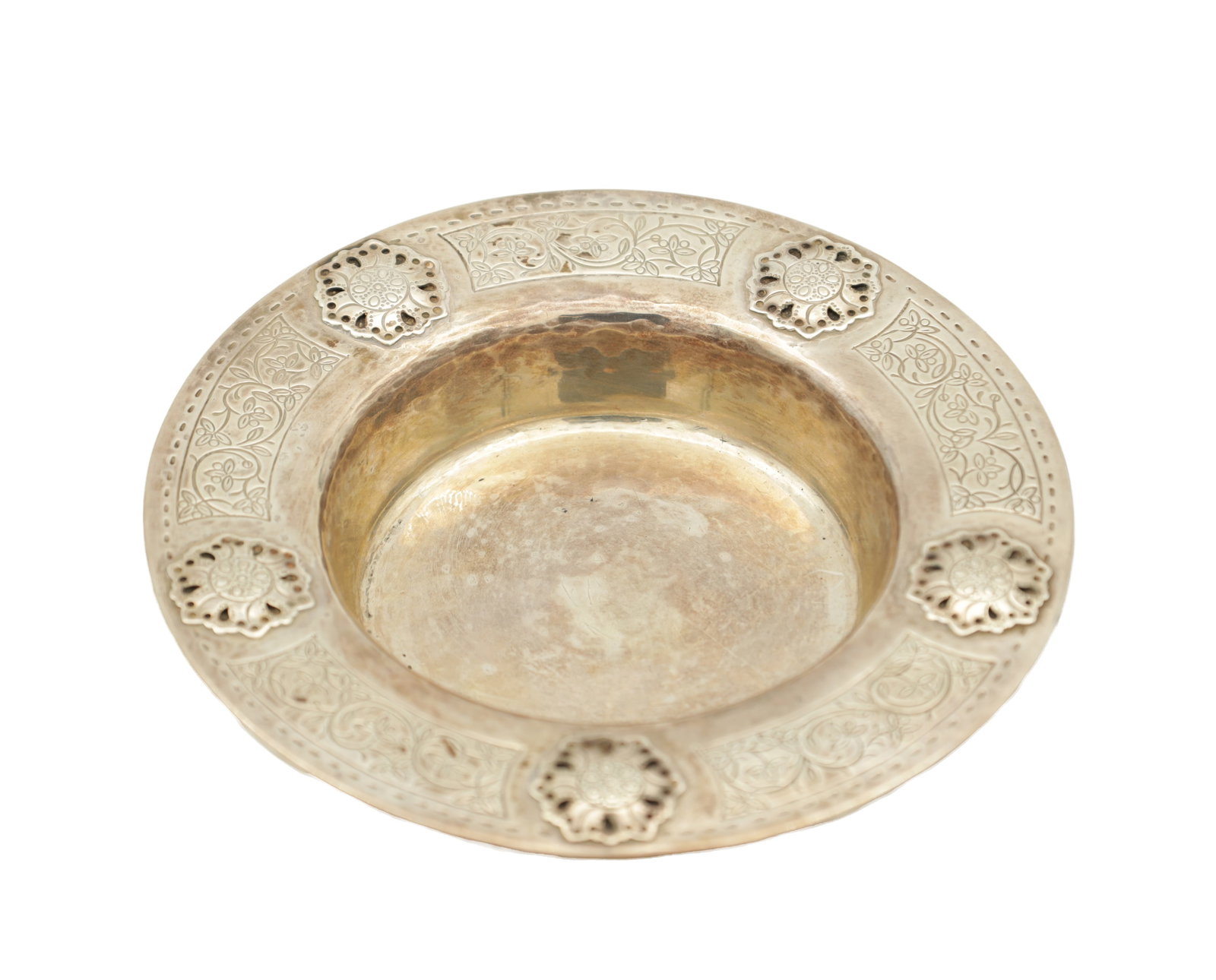 A LIBERTY & CO. ARTS AND CRAFTS SILVER DISH: A LIBERTY & CO. ARTS AND CRAFTS SILVER DISH of planished design with floral panels and applied flowerheads. Hallmarked Liberty & co. Birmingham, 1926.Total weight app. 139g. (14cm diameter)