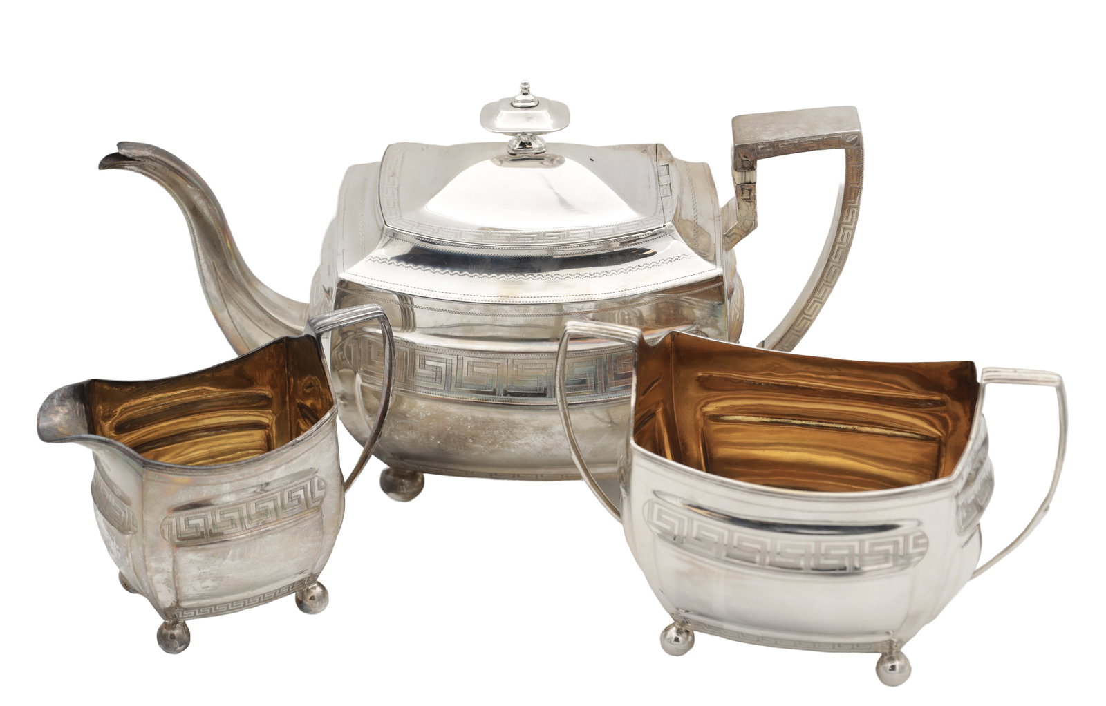 AN EARLY 19TH CENTURY SILVER THREE PIECE TEA SERVICE: AN EARLY 19TH CENTURY SILVER THREE PIECE TEA SERVICE ivory bands on the kettle handles. Hallmarked Edinburgh 1807, by George Fenwick. Total weight app. 1150g. Ivory Act 2018 Exemption Submission Refer