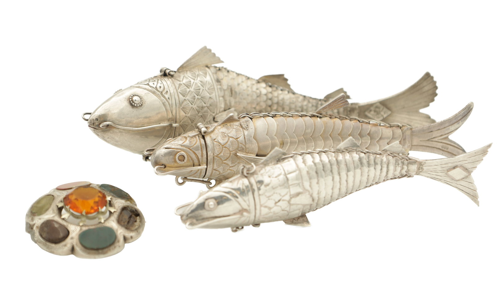 A SET OF THREE LATE 19TH CENTURY RETICULATED SILVER FISH SHAPED SCENT BOTTLES: A SET OF THREE LATE 19TH CENTURY RETICULATED SILVER FISH SHAPED SCENT BOTTLES with hinged heads and reticulated bodies, one hallmarked 900. weight app. 263 grams in total TOGETHER WITH A 19TH CENTURY