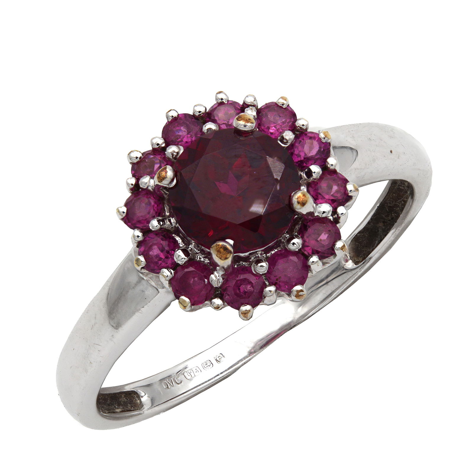 A 9CT WHITE GOLD RED AND PINK TOURMALINE HALO RING: A 9CT WHITE GOLD RED AND PINK TOURMALINE HALO RING having a central round-cut red tourmaline within a halo of twelve pink tourmalines, claw set to a plain shank, hallmarked 9ct. Total weight app. 2.6g