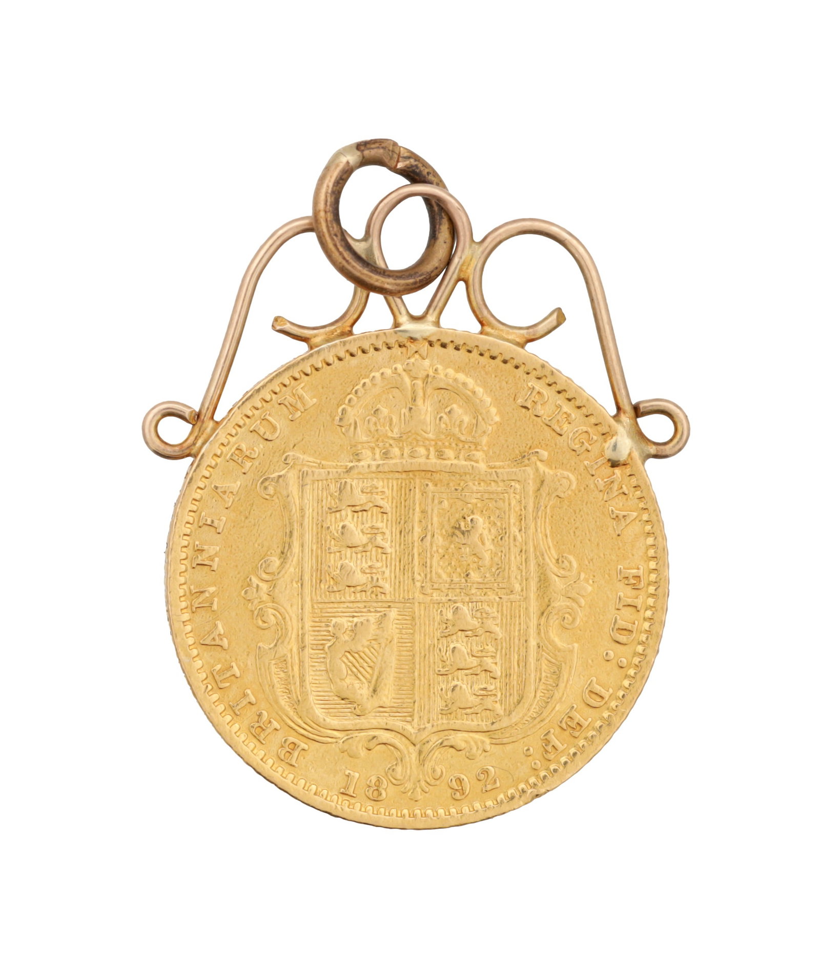 AN 1892 VICTORIA JUBILEE GOLD HALF SOVEREIGN MOUNTED AS A PENDANT IN 9CT GOLD: AN 1892 VICTORIA JUBILEE GOLD HALF SOVEREIGN MOUNTED AS A PENDANT IN 9CT GOLD the shield reverse with crowned quartered arms dated 1892 with wirework pendant mount and suspension loop, total weight ap