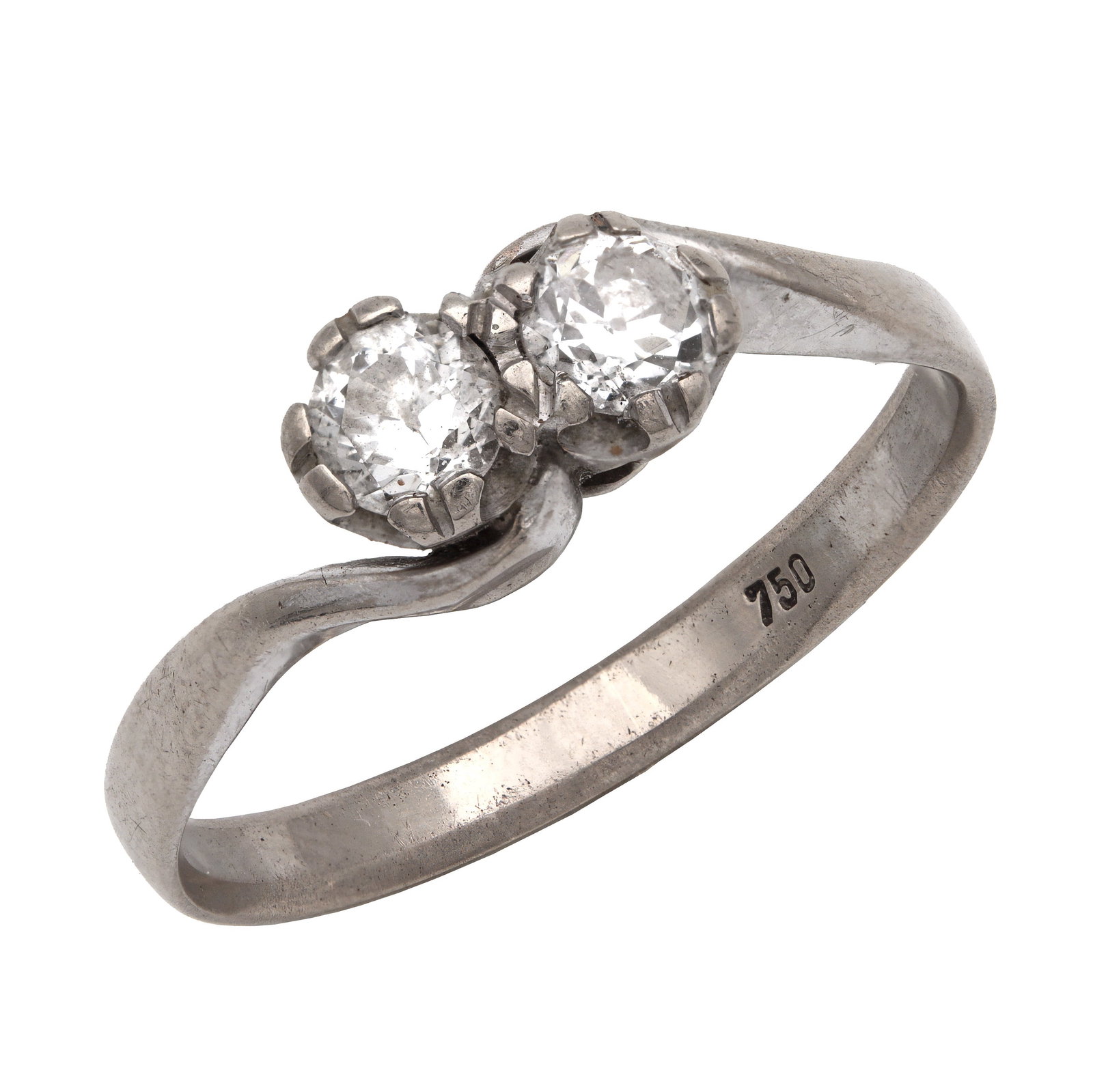 AN 18CT WHITE GOLD AND DIAMOND TWO-STONE CROSSOVER RING: AN 18CT WHITE GOLD AND DIAMOND TWO-STONE CROSSOVER RING set with two round cut diamonds 0.6ct in total in claw settings to a twisted shank stamped 750, total weight app. 3.6g, size P1/2. (Size P 1/2)
