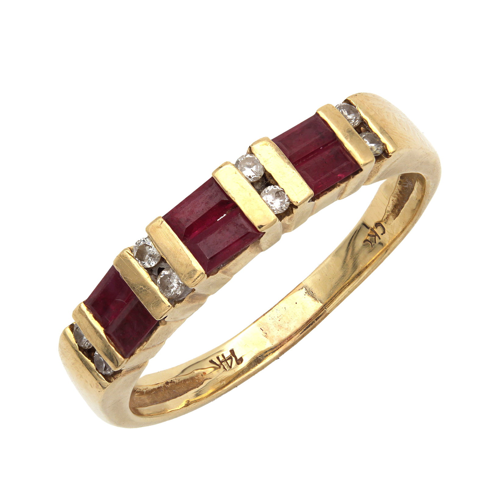 A 14CT GOLD RUBY AND DIAMOND RING: A 14CT GOLD RUBY AND DIAMOND RING having six baguette-cut rubies interspersed by eight brilliant-cut diamonds, mounted on a 14ct yellow gold band. Total weight app. 3.2g. Size P.