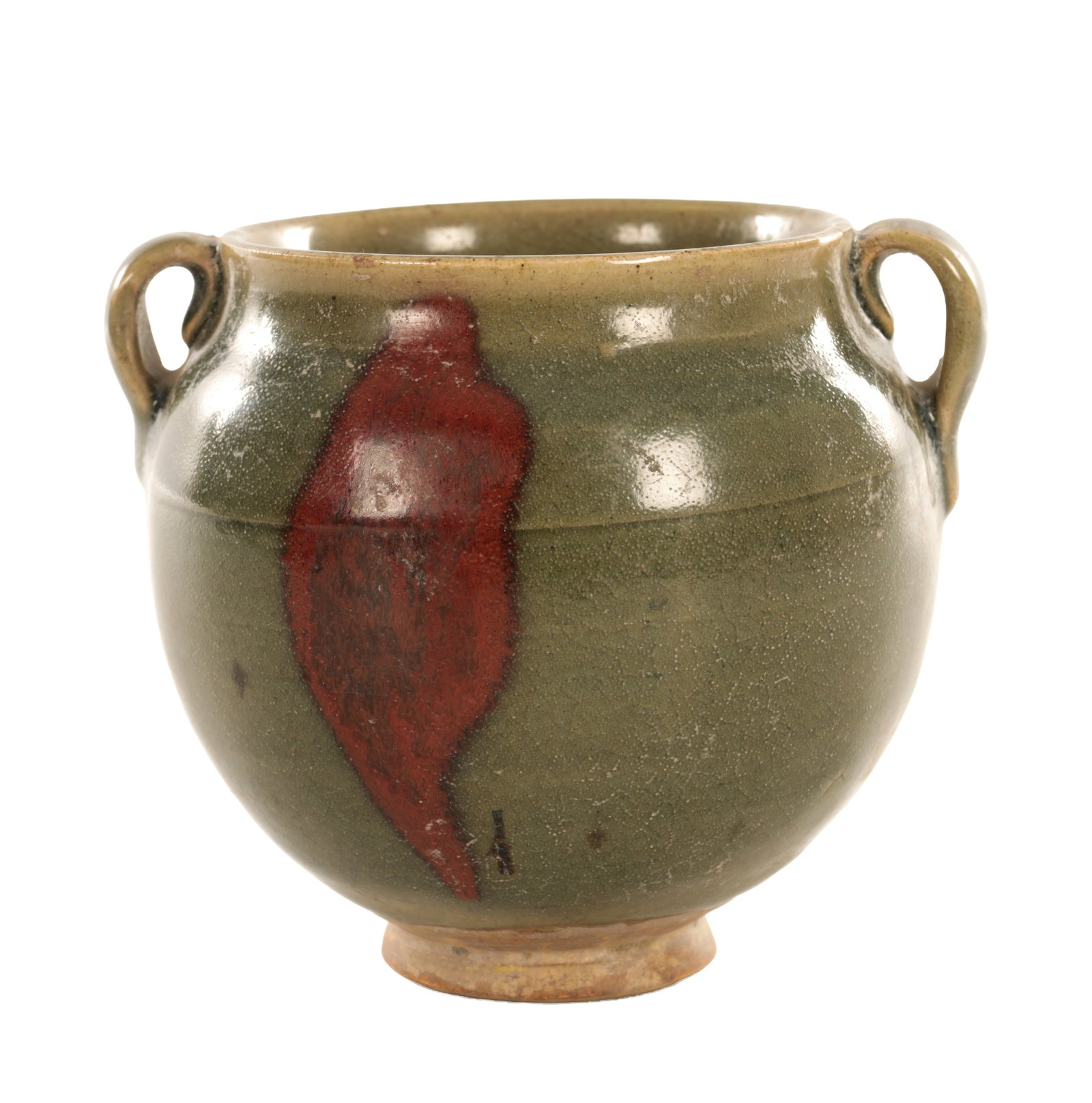 A CHINESE CRACKLED GLAZED POTTERY TWO-HANDLED JAR: A CHINESE CRACKLED GLAZED POTTERY TWO-HANDLED JAR of globular form with a slightly everted rim and opposing loop handles, covered in a mottled olive-green glaze with russet splashes, thinning to the f