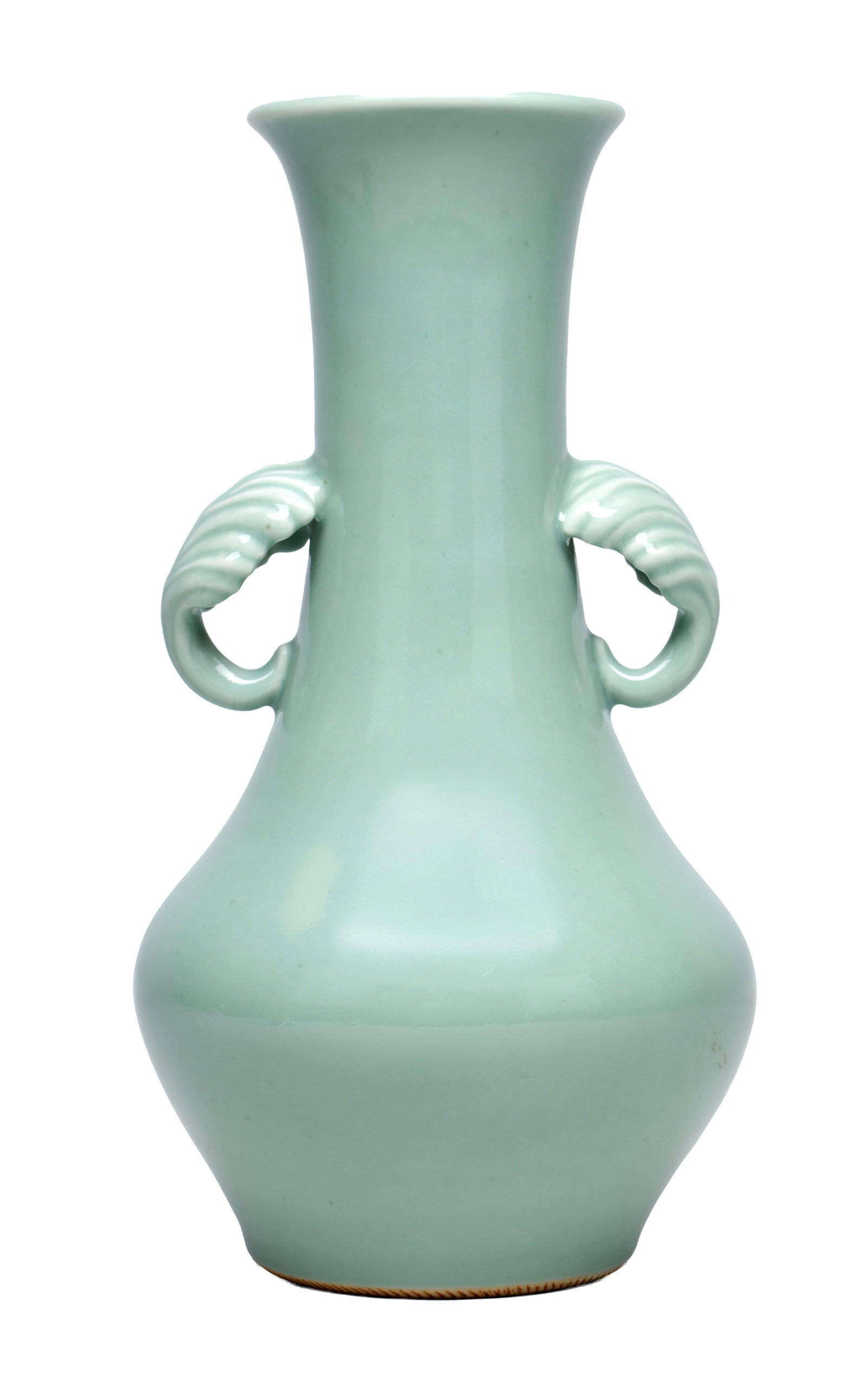 MAKUZU KOZAN A LARGE MEIJI PERIOD JAPANESE PALE GREEN CELADON GLAZE VASE: MAKUZU KOZAN A LARGE MEIJI PERIOD JAPANESE PALE GREEN CELADON GLAZE VASE of slightly flared baluster form with tall trumpet neck and twin scrolled leaf moulded side handles, the pale celadon glaze poo