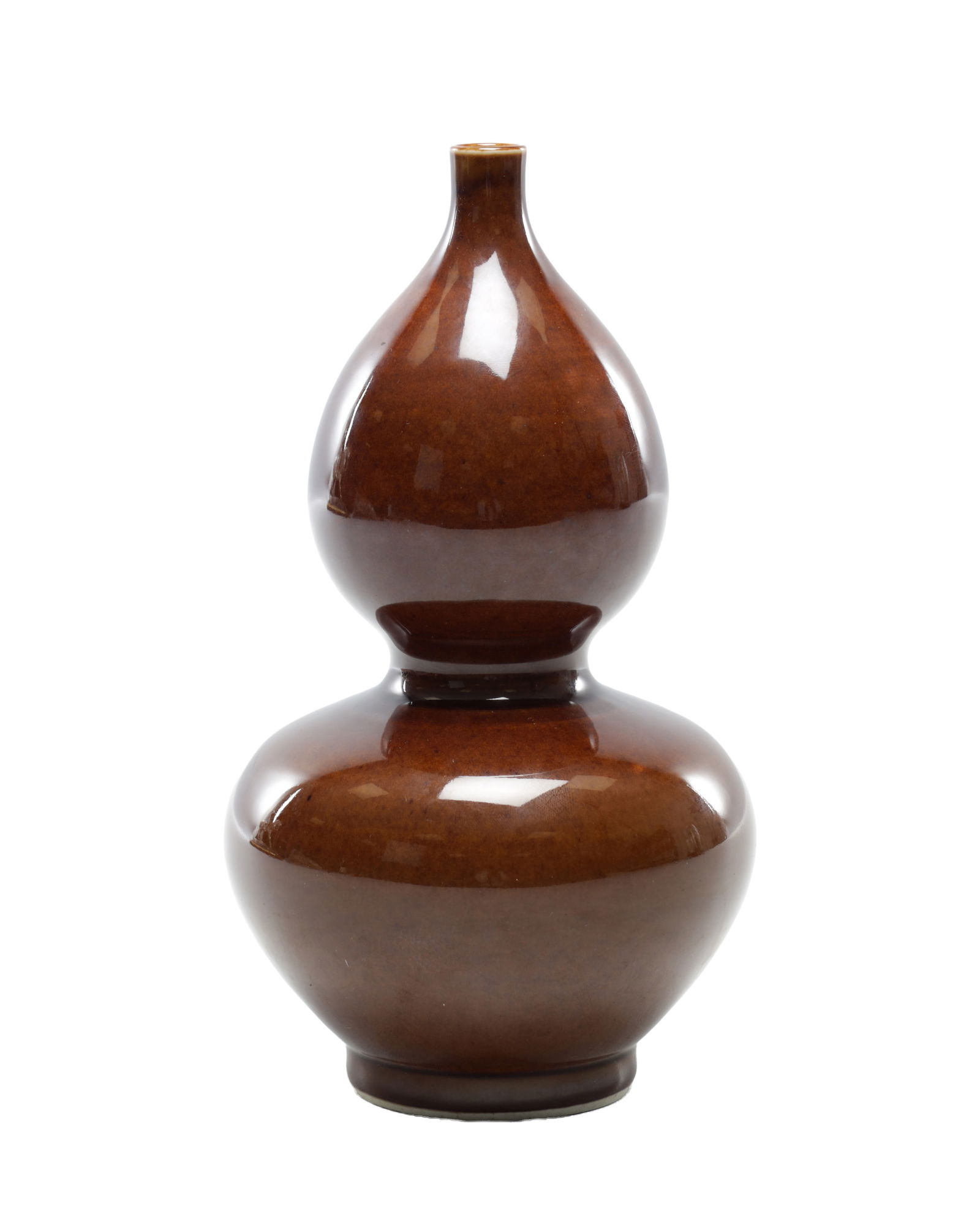 A 20TH CENTURY CHINESE BROWN GLAZED PORCELAIN DOUBLE GOURD VASE: A 20TH CENTURY CHINESE BROWN GLAZED PORCELAIN DOUBLE GOURD VASE in a mottled brown glaze, of typical bottle form with a small cylindrical neck above two globular sections, the underside bearing a six-