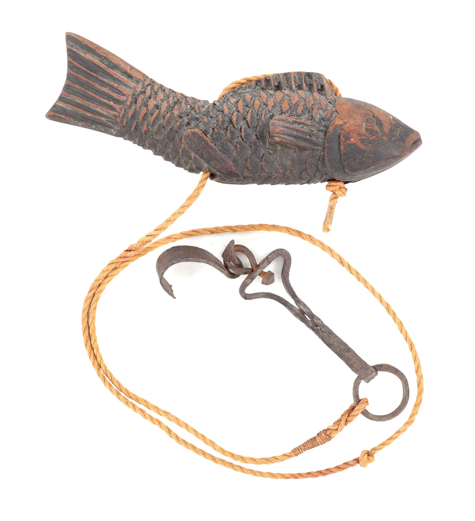 A JAPANESE CARVED WOOD KOI JIZAI OKIMONO WITH WROUGHT IRON STEELYARD HOOK AND ROPE SUSPENSION: A JAPANESE CARVED WOOD KOI JIZAI OKIMONO WITH WROUGHT IRON STEELYARD HOOK AND ROPE SUSPENSION modelled as a koi carp with incised scales and defined fins, pierced for suspension on a twisted fibre rop