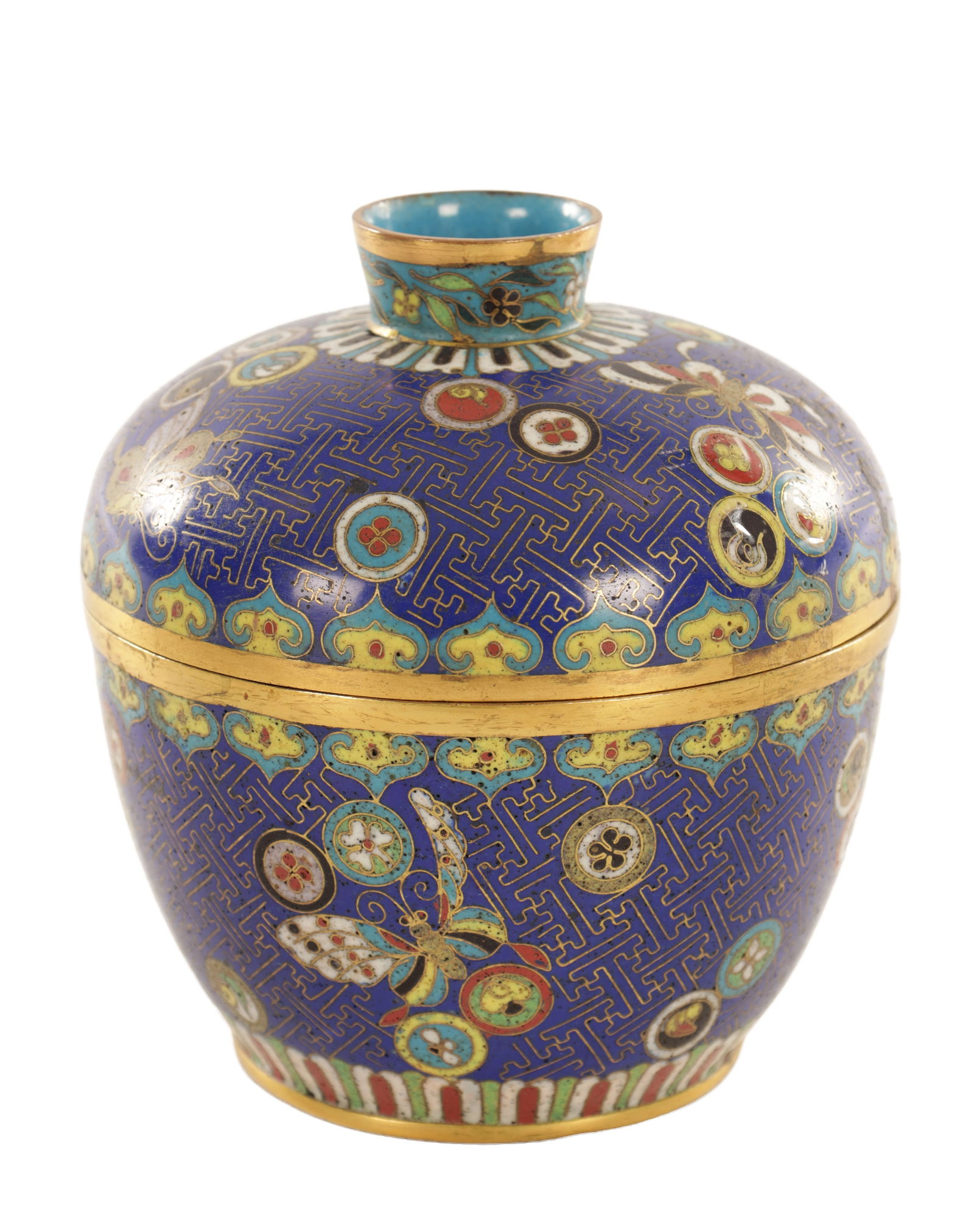 A CHINESE CLOISONNÉ ENAMEL BOWL AND COVER: A CHINESE CLOISONNÉ ENAMEL BOWL AND COVER of rounded form with a domed cover and short cylindrical neck, decorated on a cobalt-blue ground with scrolling lotus, butterflies and circular medallions en