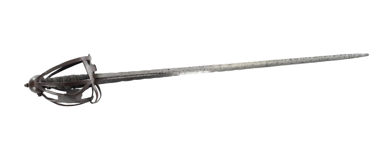 A 17TH CENTURY BASKET HILTED SWORD: A 17TH CENTURY BASKET HILTED SWORD with a single fuller twin-edge steel blade, with a slightly flamberged edge, engraved to the top of the blade. (87cm Long)