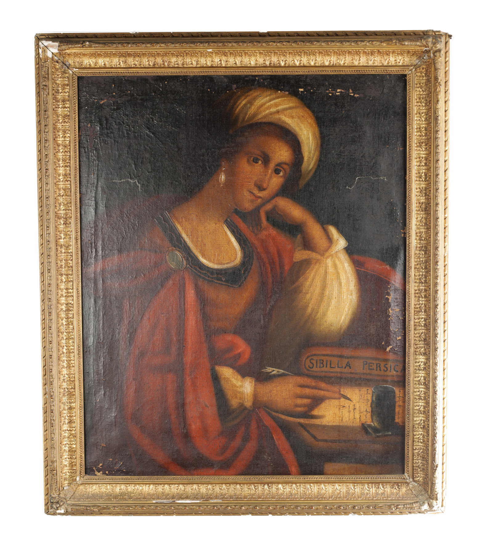 AFTER GUERCINO AN ITALIAN OIL ON CANVAS PORTRAIT OF THE PERSIAN SIBYL: AFTER GUERCINO AN ITALIAN OIL ON CANVAS PORTRAIT OF THE PERSIAN SIBYL depicting a half-length figure at a desk with quill and inkwell, the volume inscribed Sibilla Persica, presented in a gilt moulded
