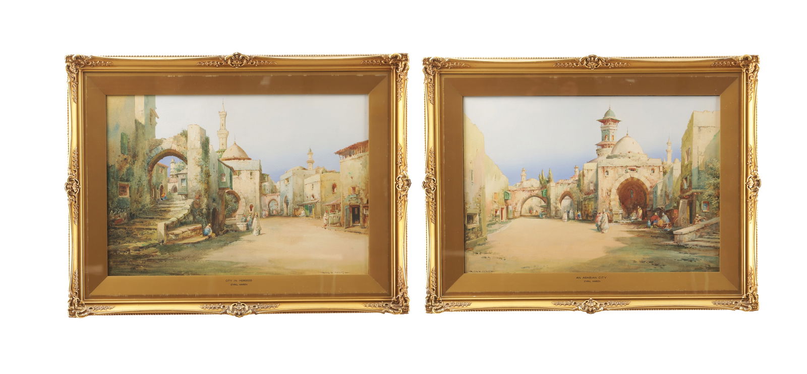NOEL HARRY LEAVER 'CYRIL HARDY' (1889-1951) AN IMPORTANT AND IMPRESSIVE REFLECTIVE PAIR OF: NOEL HARRY LEAVER 'CYRIL HARDY' (1889-1951) AN IMPORTANT AND IMPRESSIVE REFLECTIVE PAIR OF WATERCOLOURS of Moroccan street scenes with mosque, mounted in glazed gilt frames. Note: Cyril Hardy is under