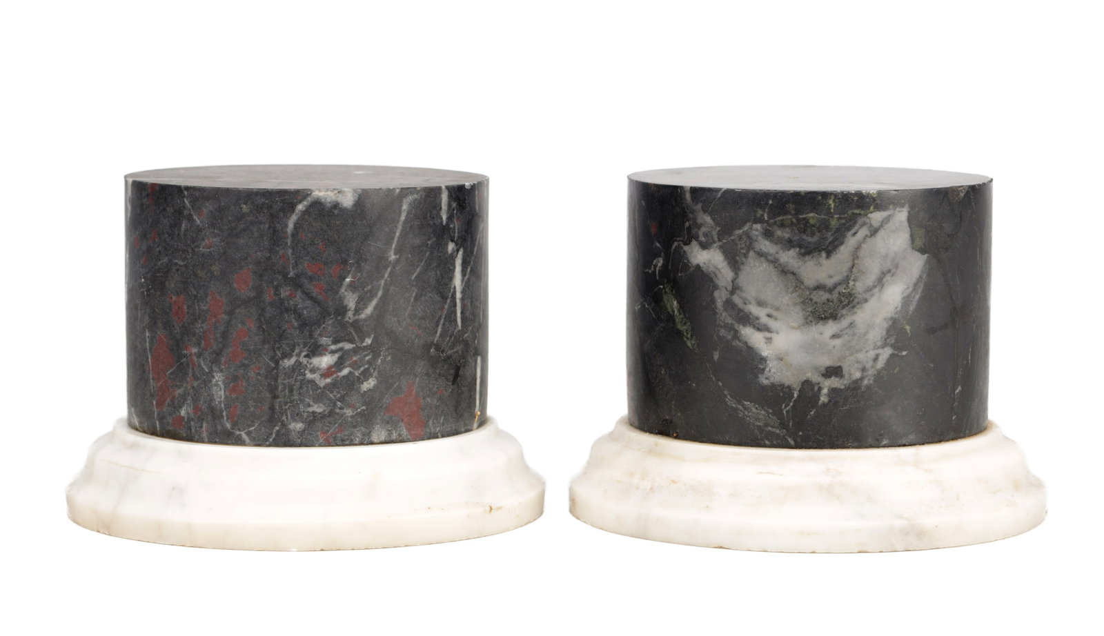 A PAIR OF 19TH CENTURY TURNED MARBLE VASE STANDS: A PAIR OF 19TH CENTURY TURNED MARBLE VASE STANDS with cylindrical black and grey veined marble bodies and moulded white marble bases. (11cm high 16cm diameter )