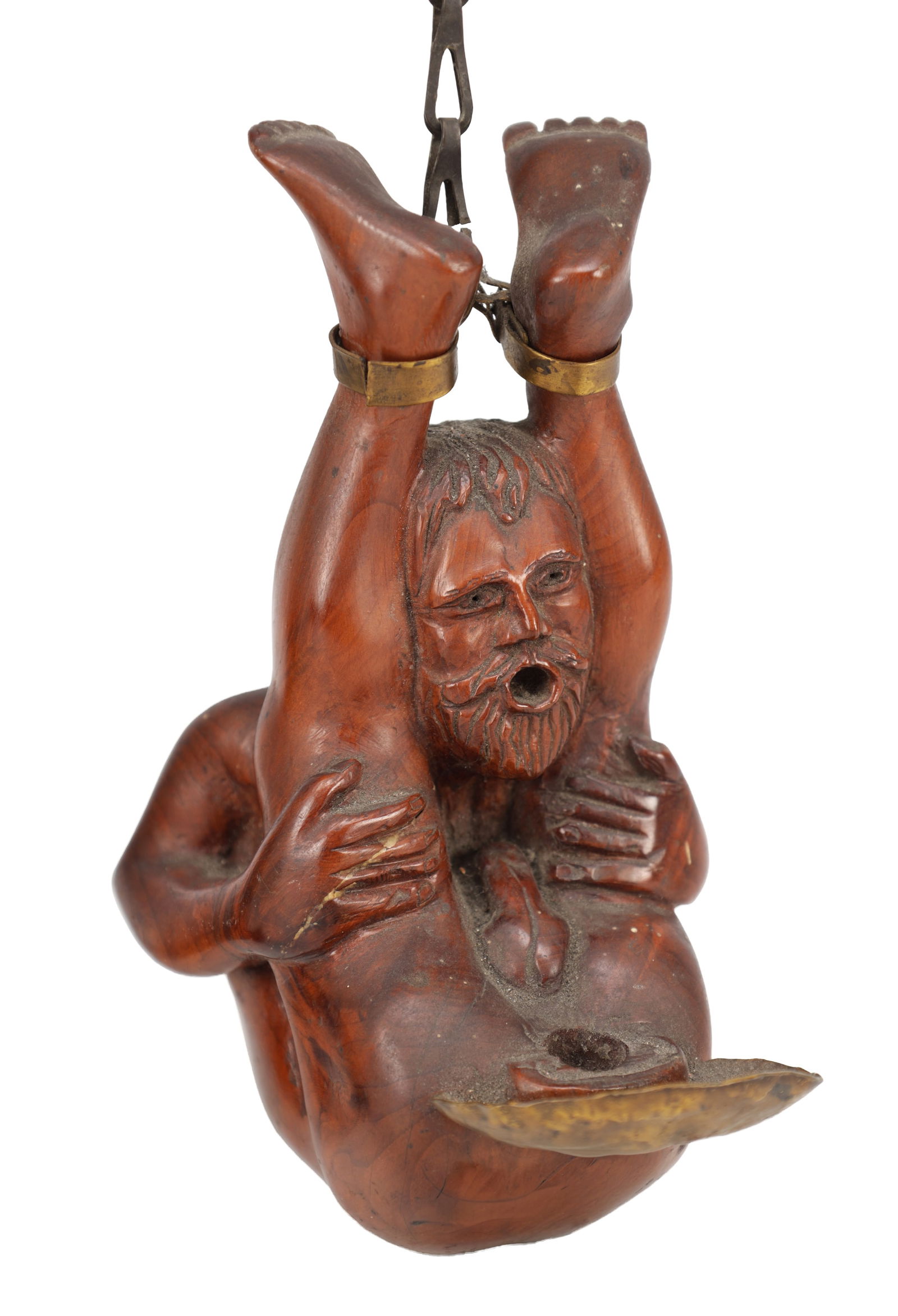 AN UNUSUAL 19TH CENTURY CARVED FRUITWOOD HANGING LAMP OF A SUPPLE GENTLEMAN: AN UNUSUAL 19TH CENTURY CARVED FRUITWOOD HANGING LAMP OF A SUPPLE GENTLEMAN modelled as a bearded figure clasping his raised legs with brass ankle restraints and suspension chain, with a candlestick h