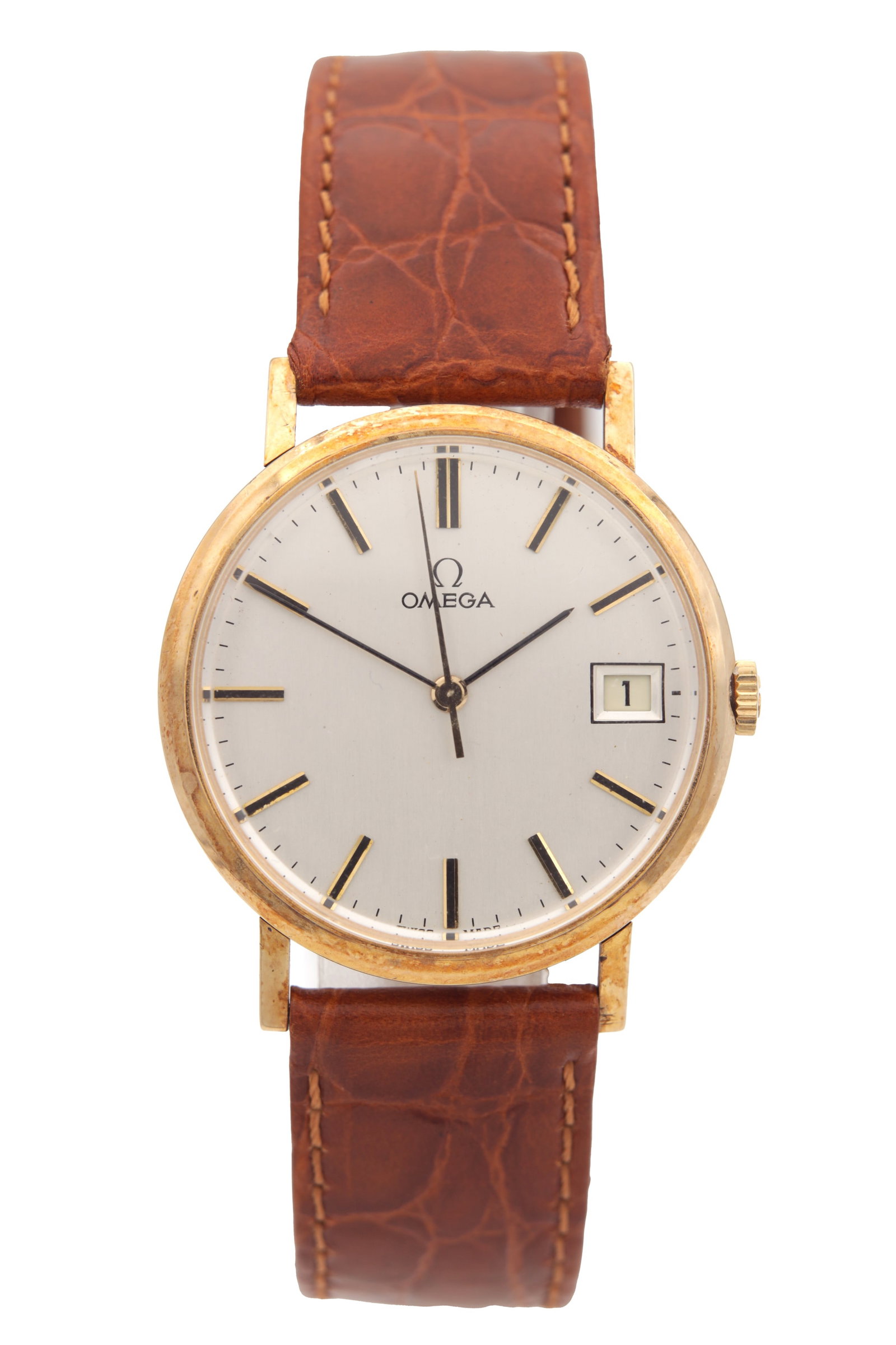 A GENTLEMAN'S 9CT GOLD OMEGA WRIST WATCH WITH BOX AND PAPERS: A GENTLEMAN'S 9CT GOLD OMEGA WRIST WATCH WITH BOX AND PAPERS on crocodile leather strap, the gold case enclosing a brushed silvered dial with gold baton markers and calendar aperture fronting a 17-jew