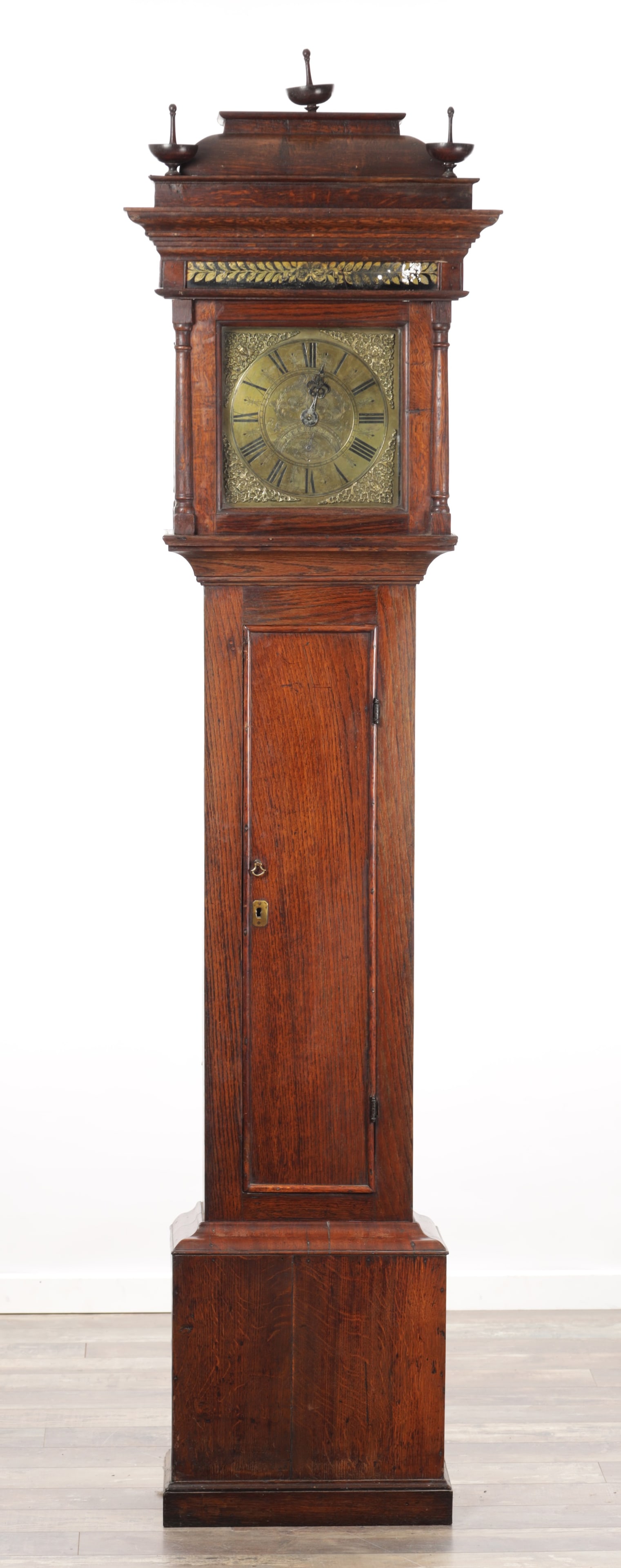 JOSEPH COOPER, MALPAS. A SMALL GEORGE II ELM AND WALNUT 30-HOUR LONGCASE CLOCK WITH CADDY TOP: JOSEPH COOPER, MALPAS. A SMALL GEORGE II ELM AND WALNUT 30-HOUR LONGCASE CLOCK WITH CADDY TOP the nicely proportioned case having a caddy top above an eglomise panelled frieze and moulded trunk door,