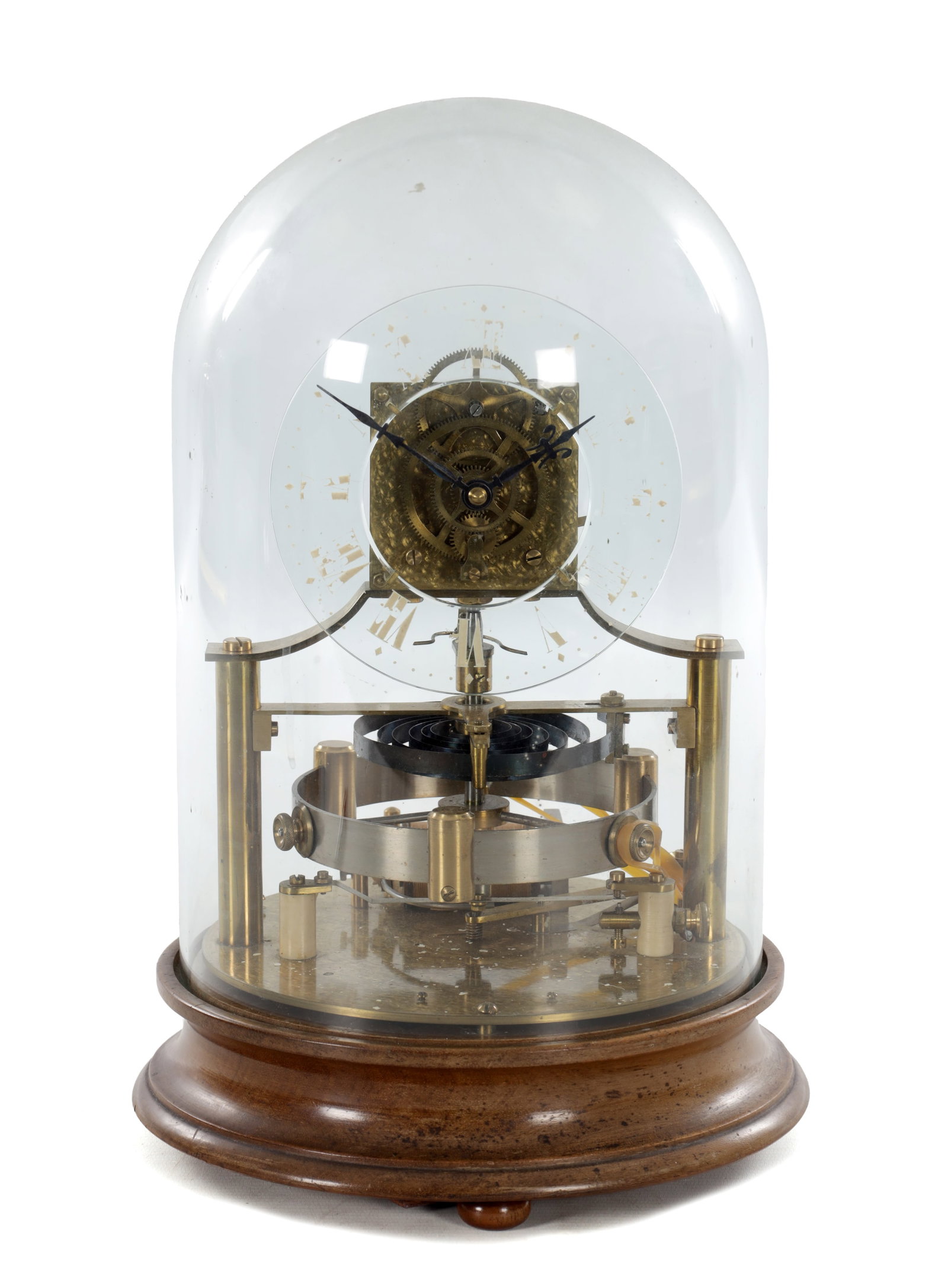 THE REASON MANUFACTURING COMPANY LTD. AN EARLY 20TH CENTURY MURDAY TYPE ELECTRIC CLOCK WITH GLASS: THE REASON MANUFACTURING COMPANY LTD. AN EARLY 20TH CENTURY MURDAY TYPE ELECTRIC CLOCK WITH GLASS DIAL UNDER GLASS DOME ON TURNED MAHOGANY BASE the circular glass dial with Roman numerals and blued ha