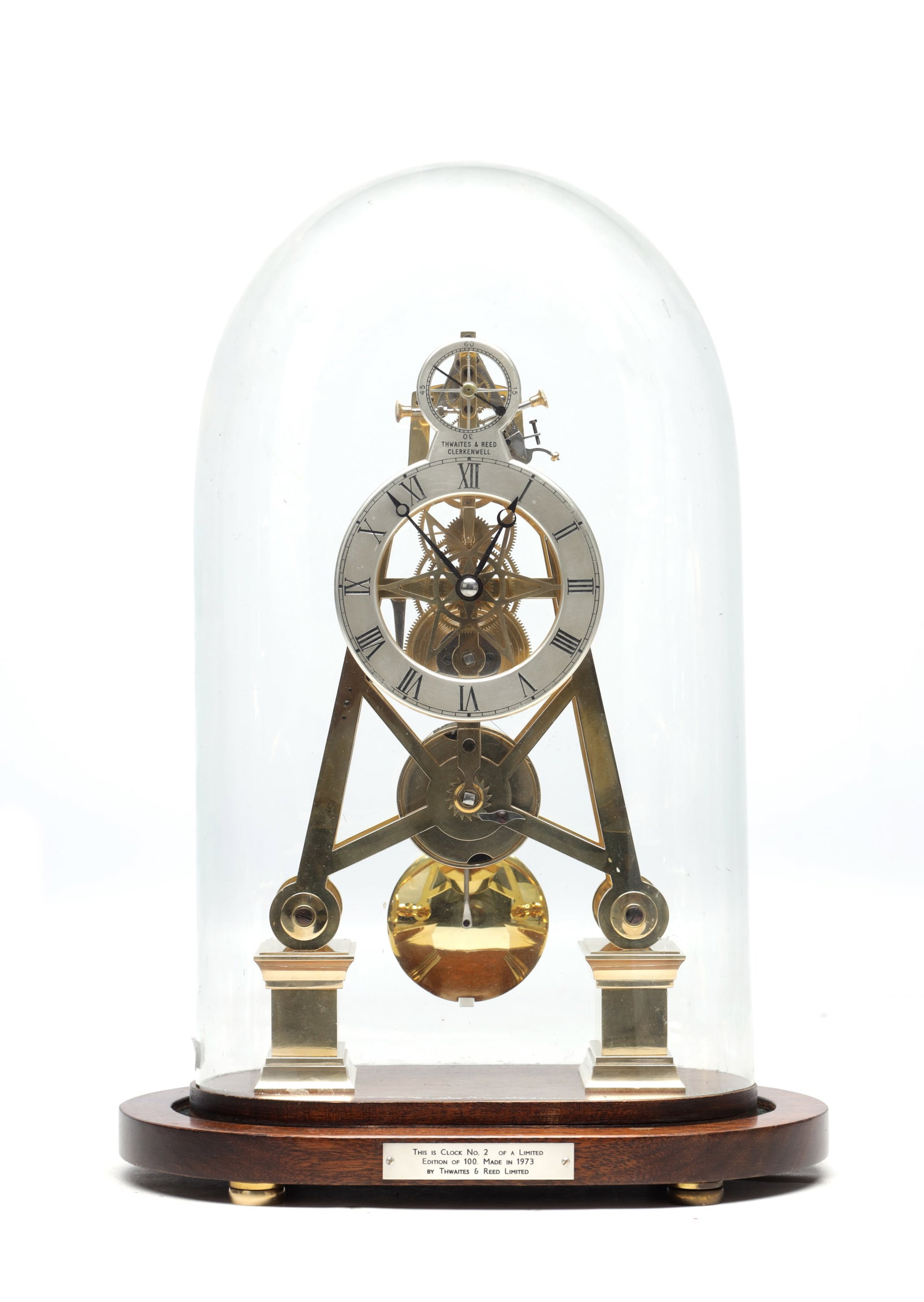 A 1973 LIMITED EDITION THWAITES & REED BRASS SKELETON CLOCK WITH COUP PERDU ESCAPEMENT: A 1973 LIMITED EDITION THWAITES & REED BRASS SKELETON CLOCK WITH COUP PERDU ESCAPEMENT No.2 of 100, the eight day fusee timepiece movement with Harrison’s maintaining power and adjustable pallets, s