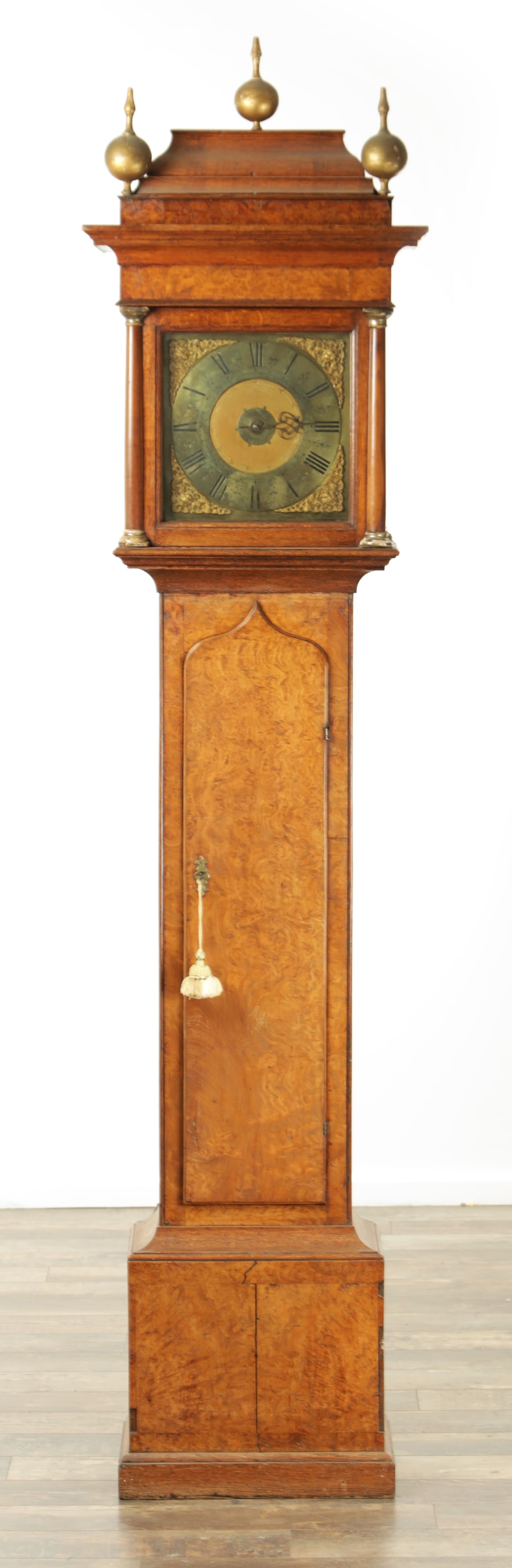 WILLIAM CRAWSHAW, WORSBOROUGH/BARNSLEY. AN EARLY 18TH CENTURY BURR ELM AND OAK LONGCASE: WILLIAM CRAWSHAW, WORSBOROUGH/BARNSLEY. AN EARLY 18TH CENTURY BURR ELM AND OAK LONGCASE the case of small proportions with a caddy top surmounted by three brass ball finials above a glazed hood door f