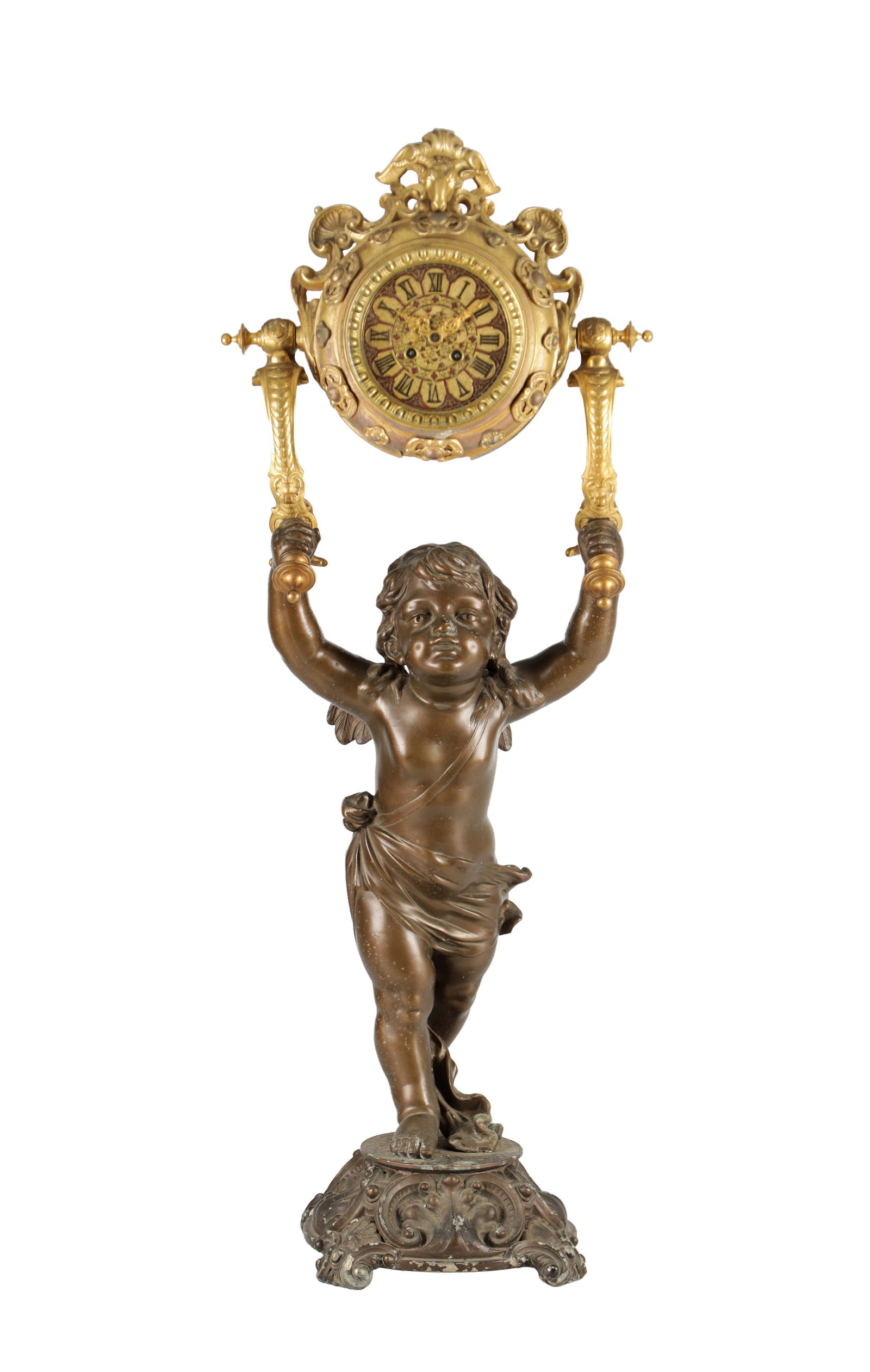A LATE 19TH CENTURY FRENCH ORMOLU AND PATINATED METAL FIGURAL CLOCK: A LATE 19TH CENTURY FRENCH ORMOLU AND PATINATED METAL FIGURAL CLOCK with a circular pierced gilt dial with Roman numerals supported between torch-form uprights held aloft by a standing putto on a cast