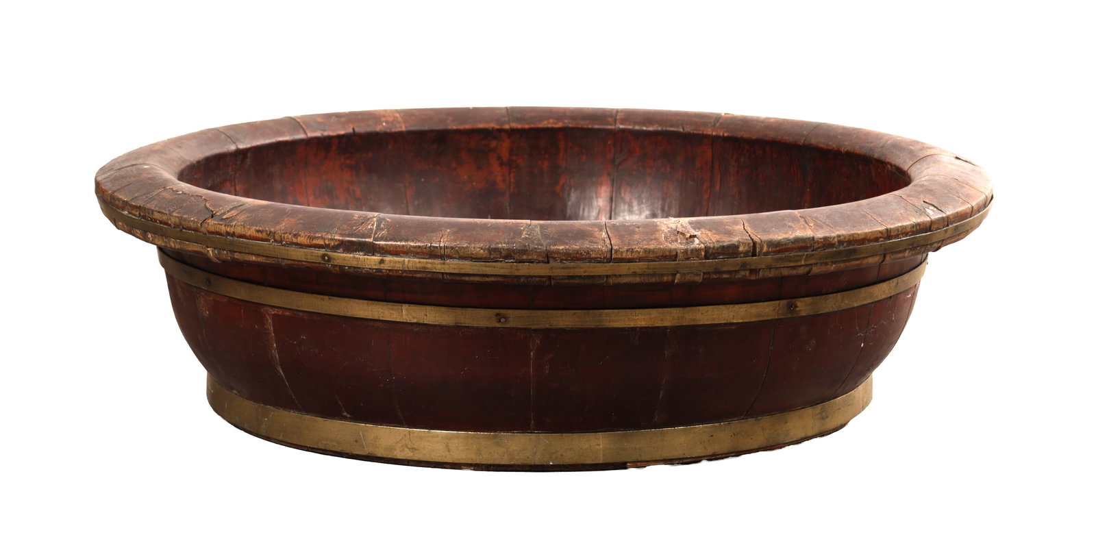 A LARGE BRASS-BOUND COOPERED WOODEN BOWL: A LARGE BRASS-BOUND COOPERED WOODEN BOWL of circular form with a broad rounded rim and shallow sides, the staved body secured by two brass hoops and set on a low foot, with a stained finish.