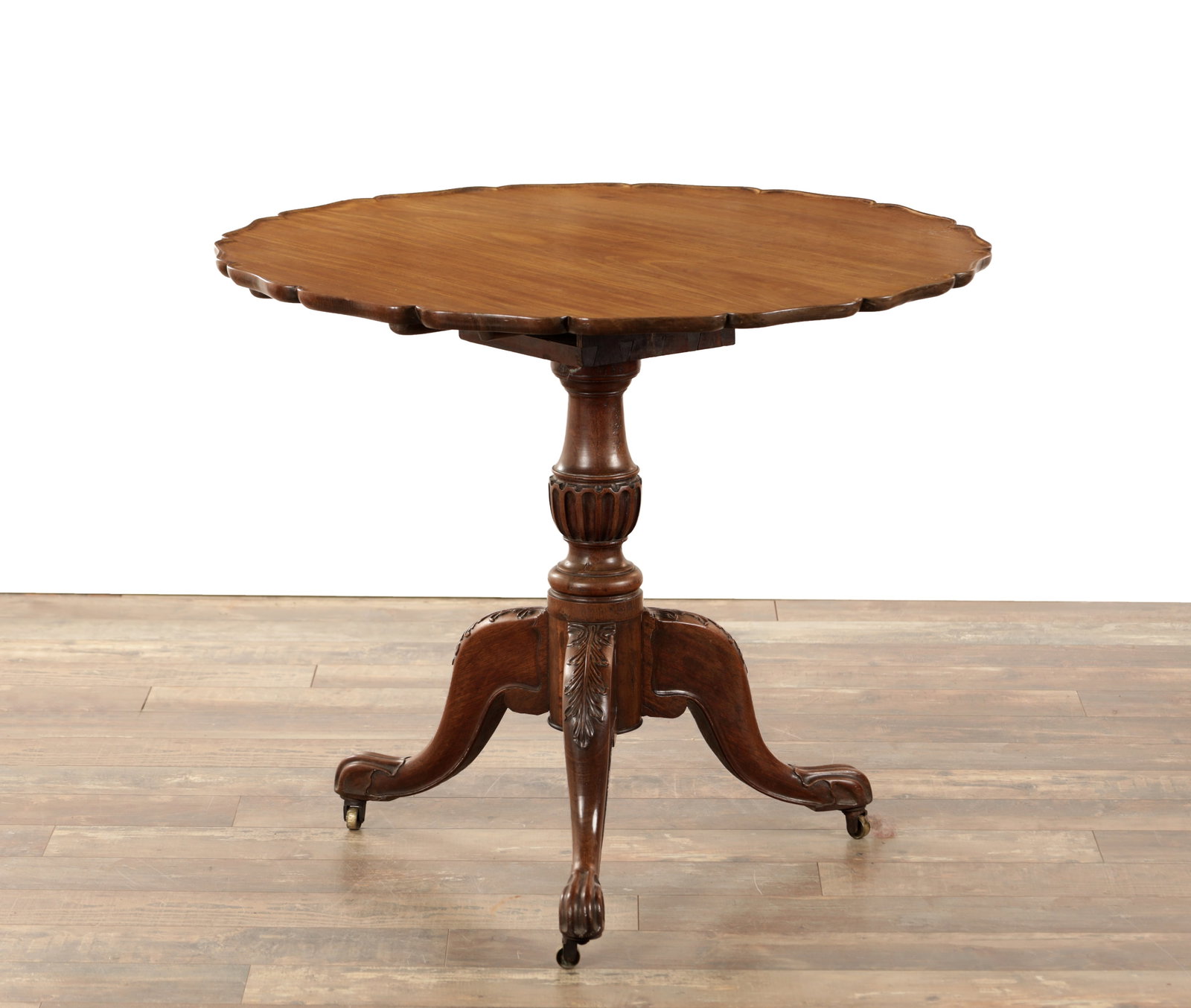 A GEORGE III FIGURED MAHOGANY TILT-TOP TABLE (1 of 5)