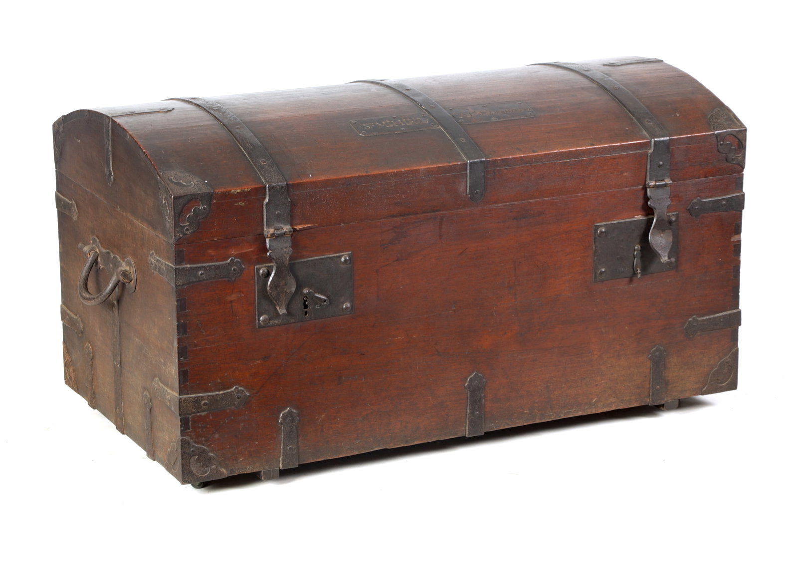 A 19TH CENTURY WALNUT AND IRON BOUND DOME TOP OFFICERS TRUNK: A 19TH CENTURY WALNUT AND IRON BOUND DOME TOP OFFICERS TRUNK with domed lid and iron strapwork, shaped corner brackets, side carrying ring handles and twin hasp lock plates to the front, bearing a nam