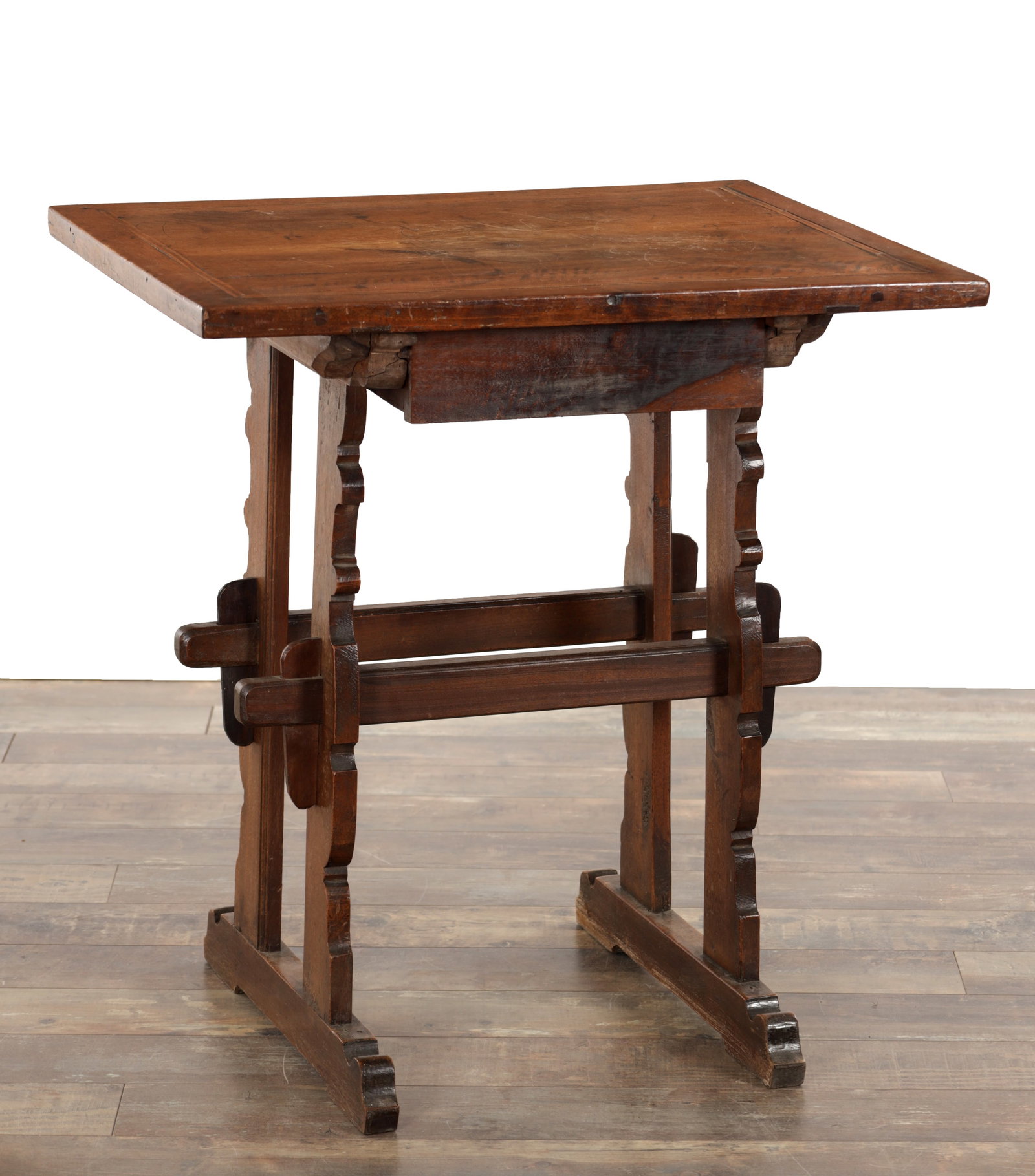 AN 18TH CENTURY SPANISH SOLID WALNUT SIDE TABLE: AN 18TH CENTURY SPANISH SOLID WALNUT SIDE TABLE the rectangular top with a moulded edge above a frieze drawer, raised on shaped supports joined by stretchers and terminating in shaped sled feet. (72cm