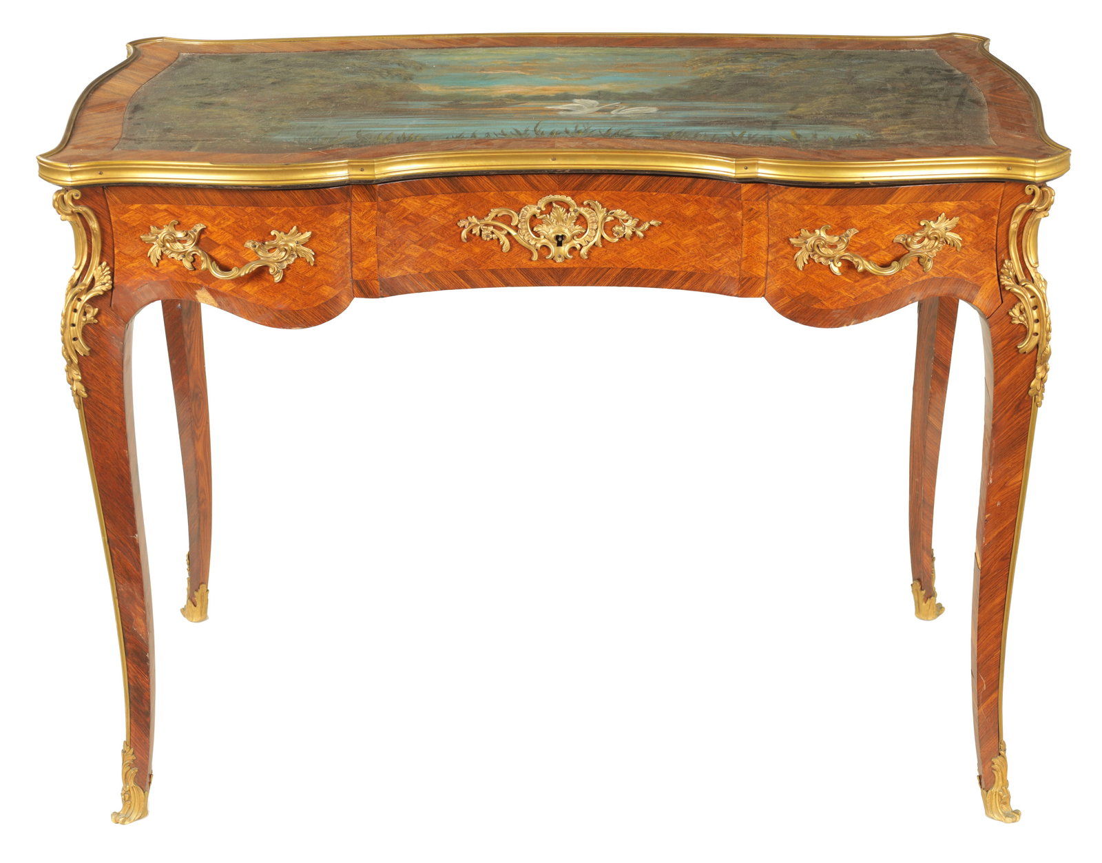 A 19TH CENTURY KINGWOOD PARQUETRY AND ORMOLU MOUNTED WRITING TABLE WITH PAINTED TOP: A 19TH CENTURY KINGWOOD PARQUETRY AND ORMOLU MOUNTED WRITING TABLE WITH PAINTED TOP of serpentine outline, the top painted with a lake and woodland scene with swans and enclosed by a gilt-bronze mould