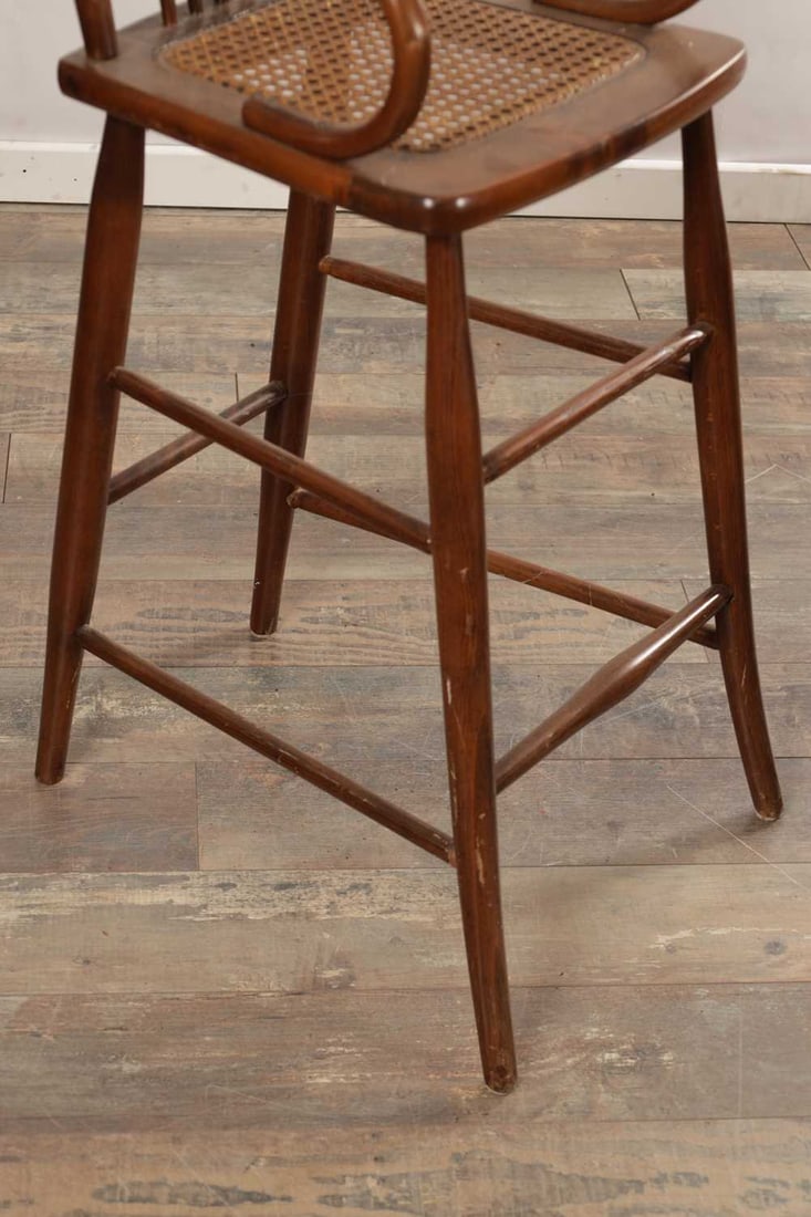 AN EARLY 20TH CENTURY AMERICAN CHILD'S HIGH CHAIR WITH CANE SEAT - 5