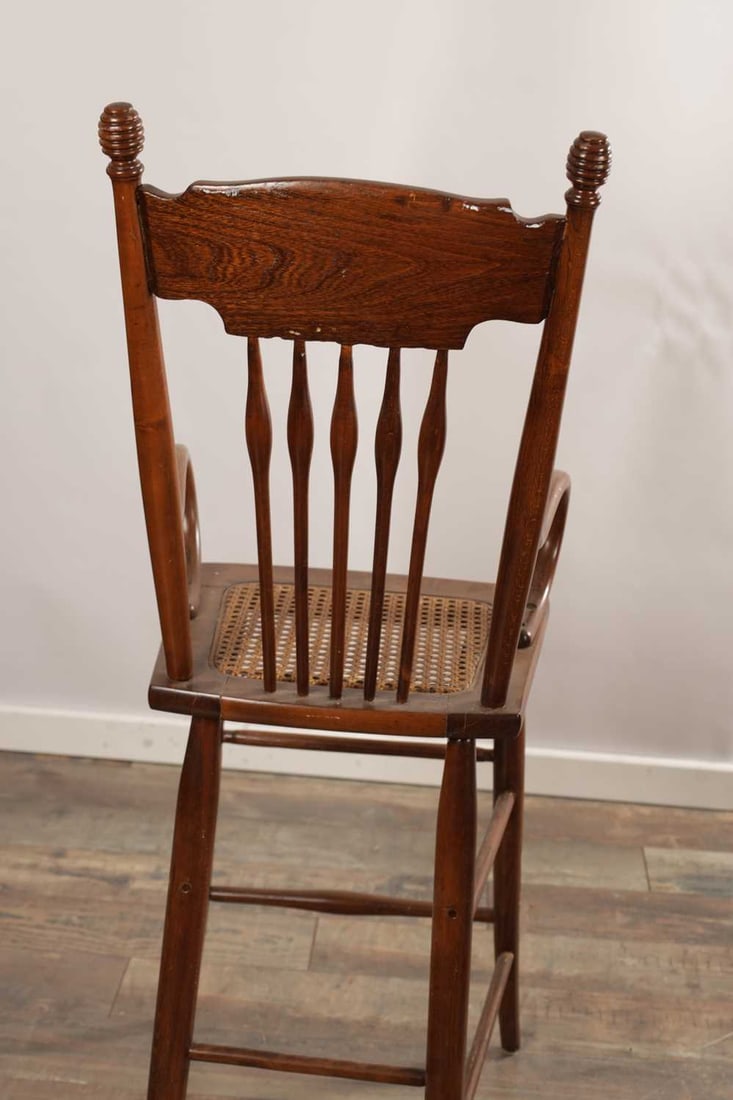 AN EARLY 20TH CENTURY AMERICAN CHILD'S HIGH CHAIR WITH CANE SEAT - 6